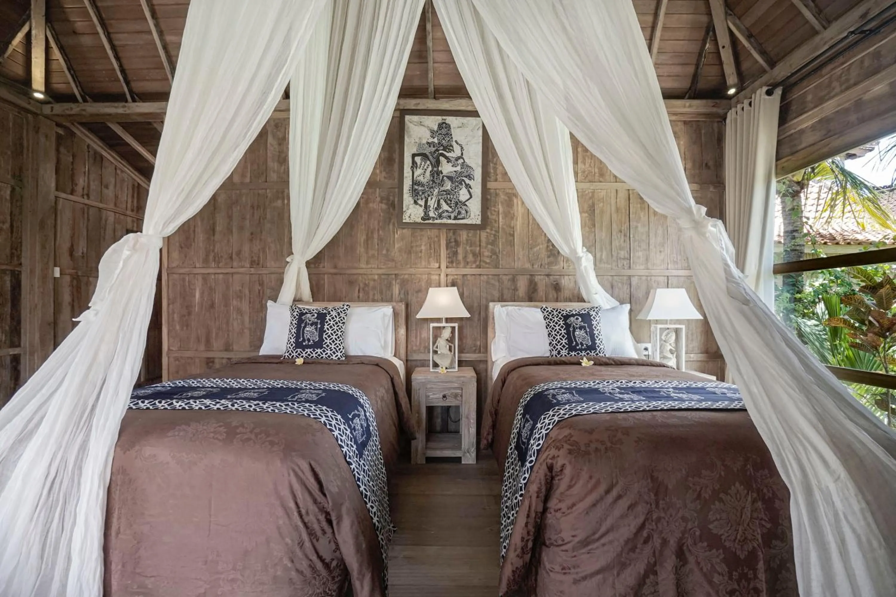 Bed in Kirani Joglo Villa Bali by Mahaputra