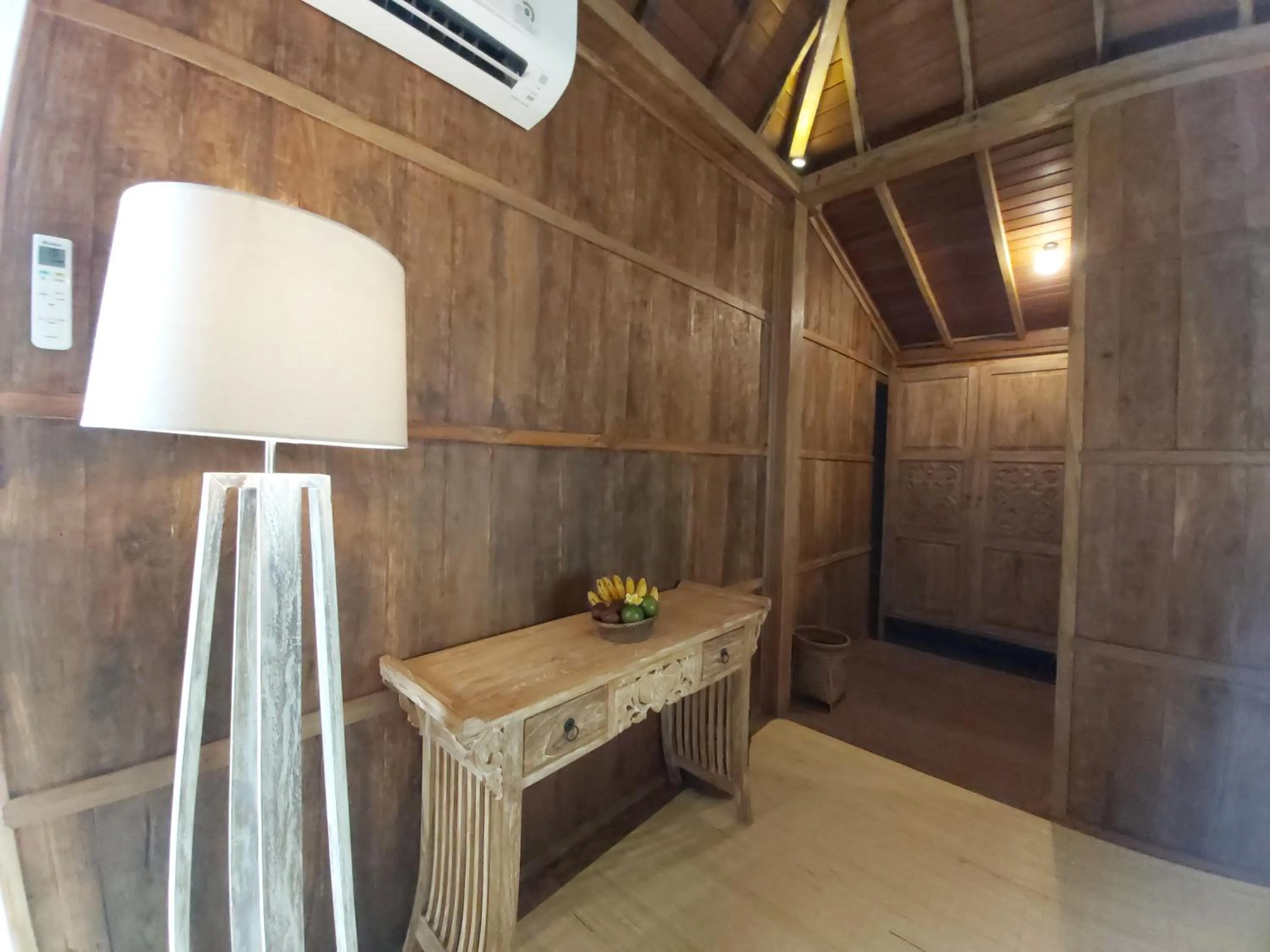 Seating area in Kirani Joglo Villa Bali by Mahaputra