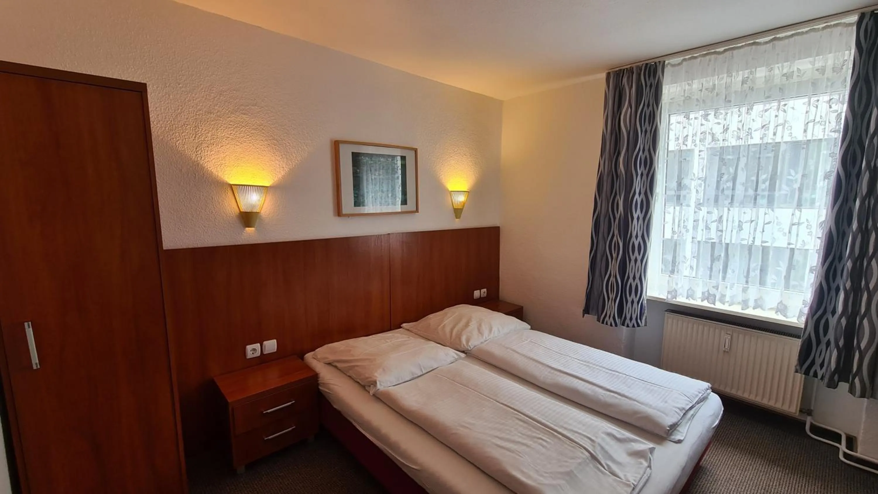 Bed in Hotel Zentrum