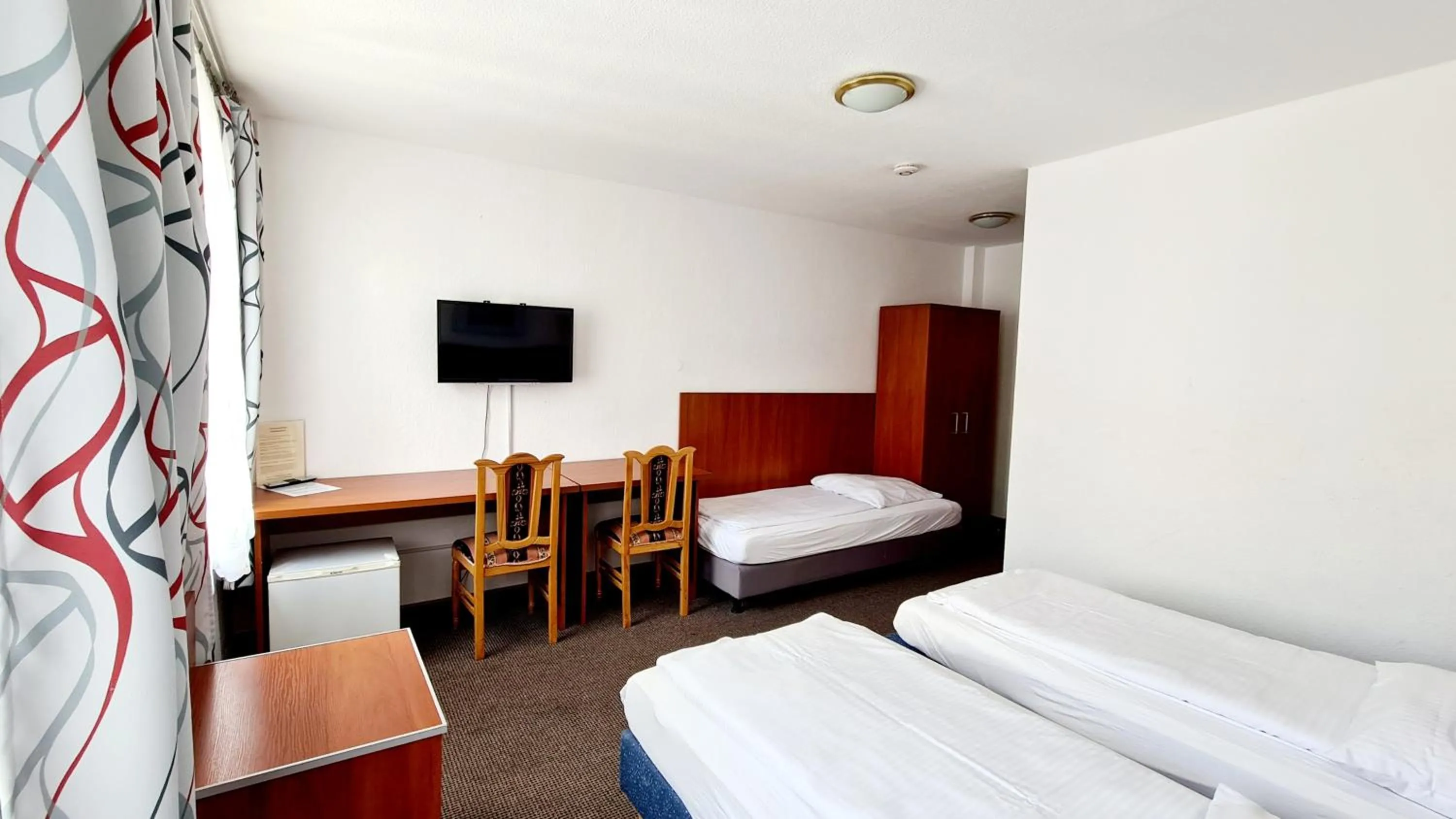 Bed in Hotel Zentrum