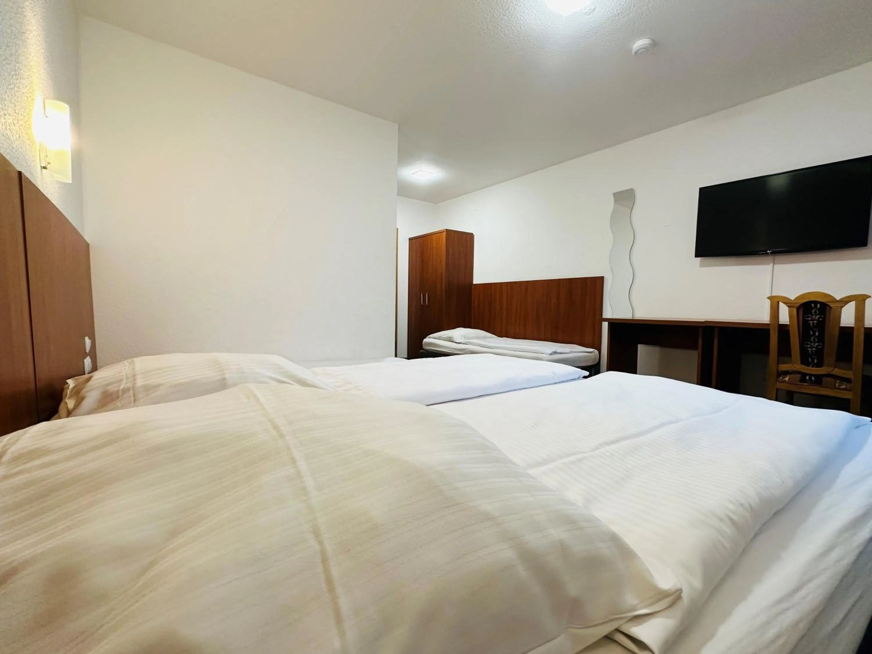 Bed in Hotel Zentrum