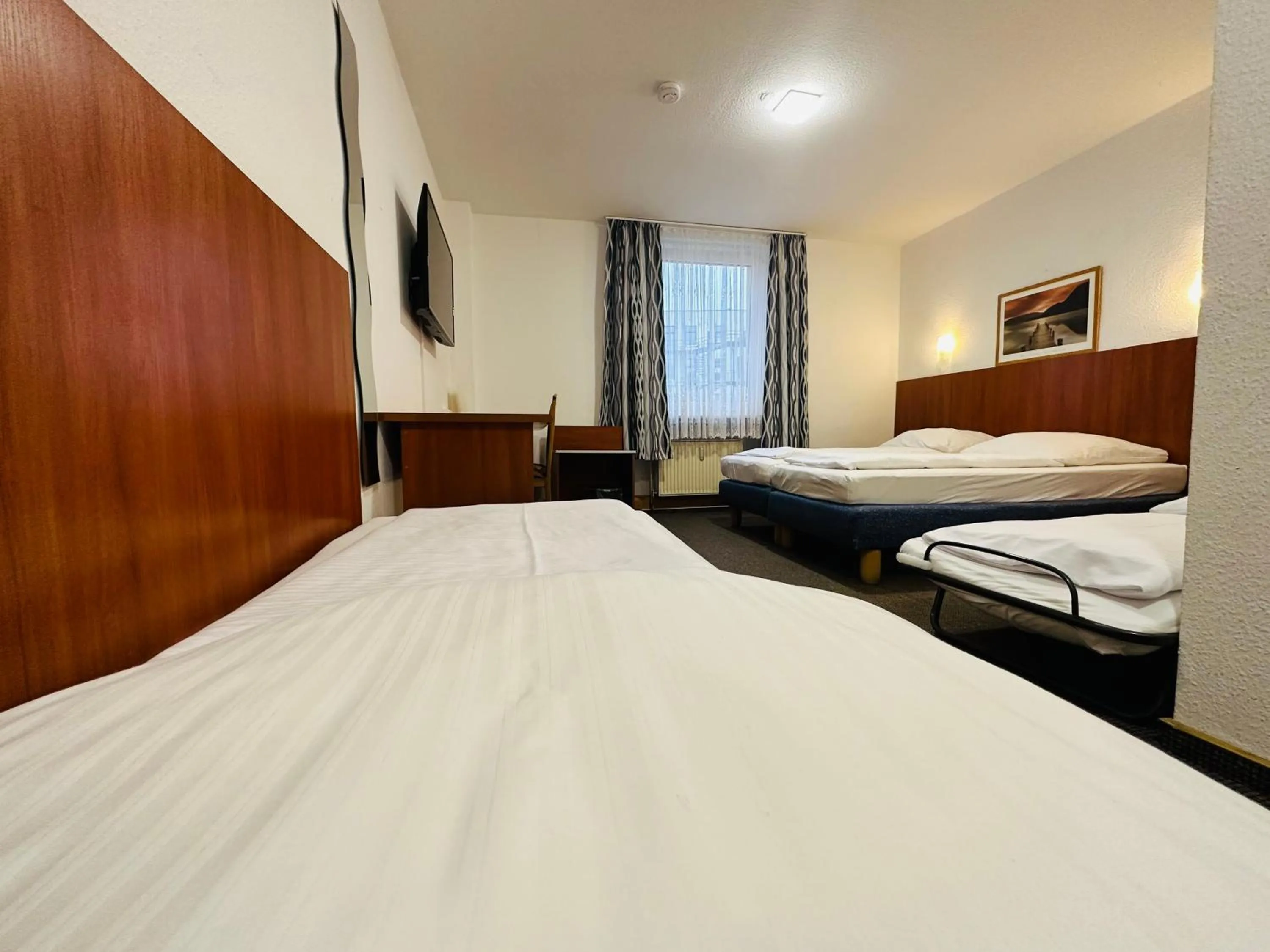 Bed in Hotel Zentrum