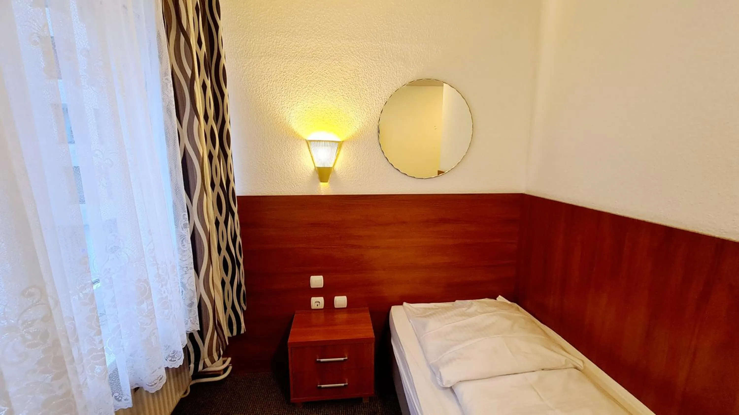 Bed in Hotel Zentrum