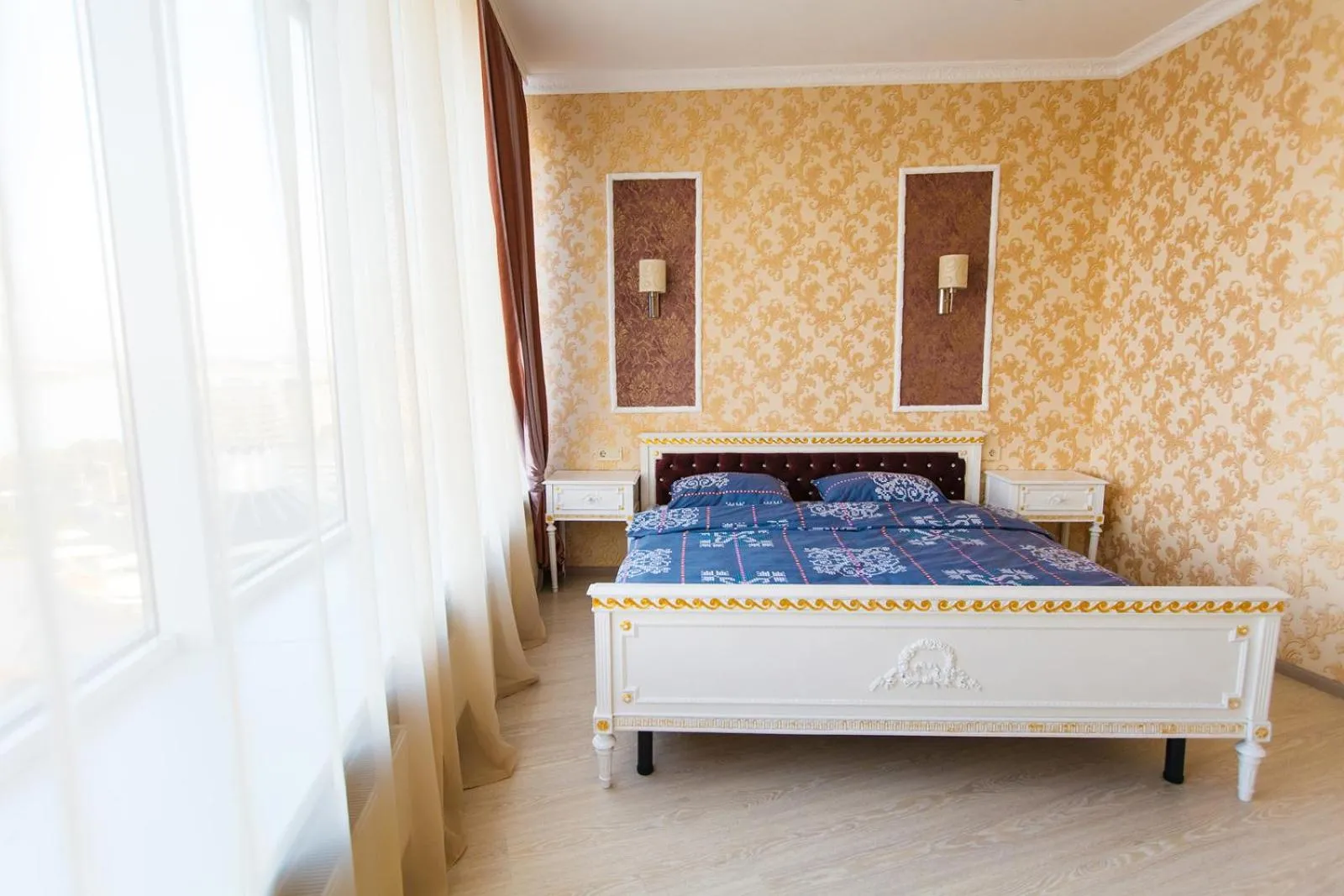 Bed in Sun City Apart Hotel