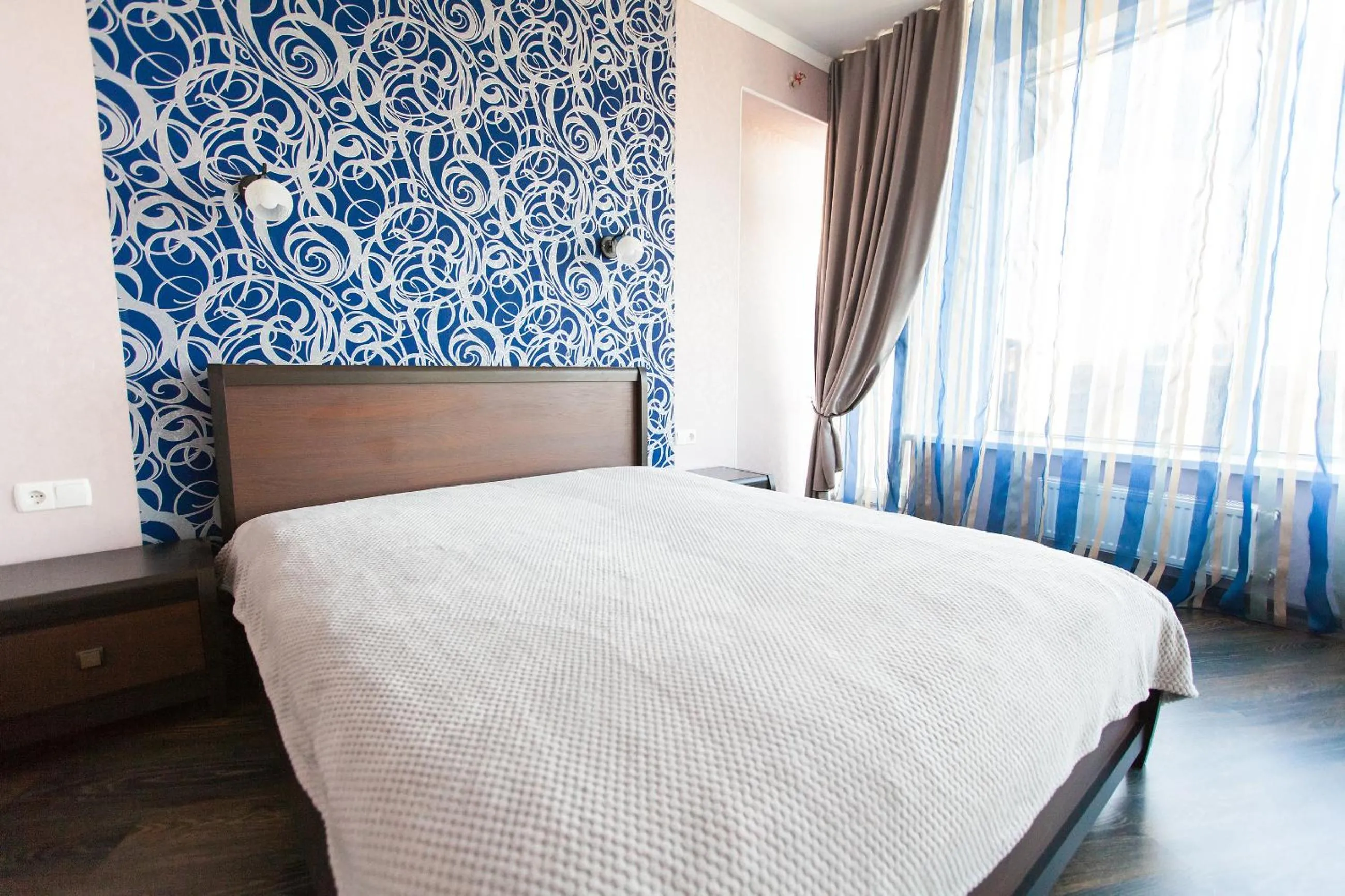 Bed in Sun City Apart Hotel