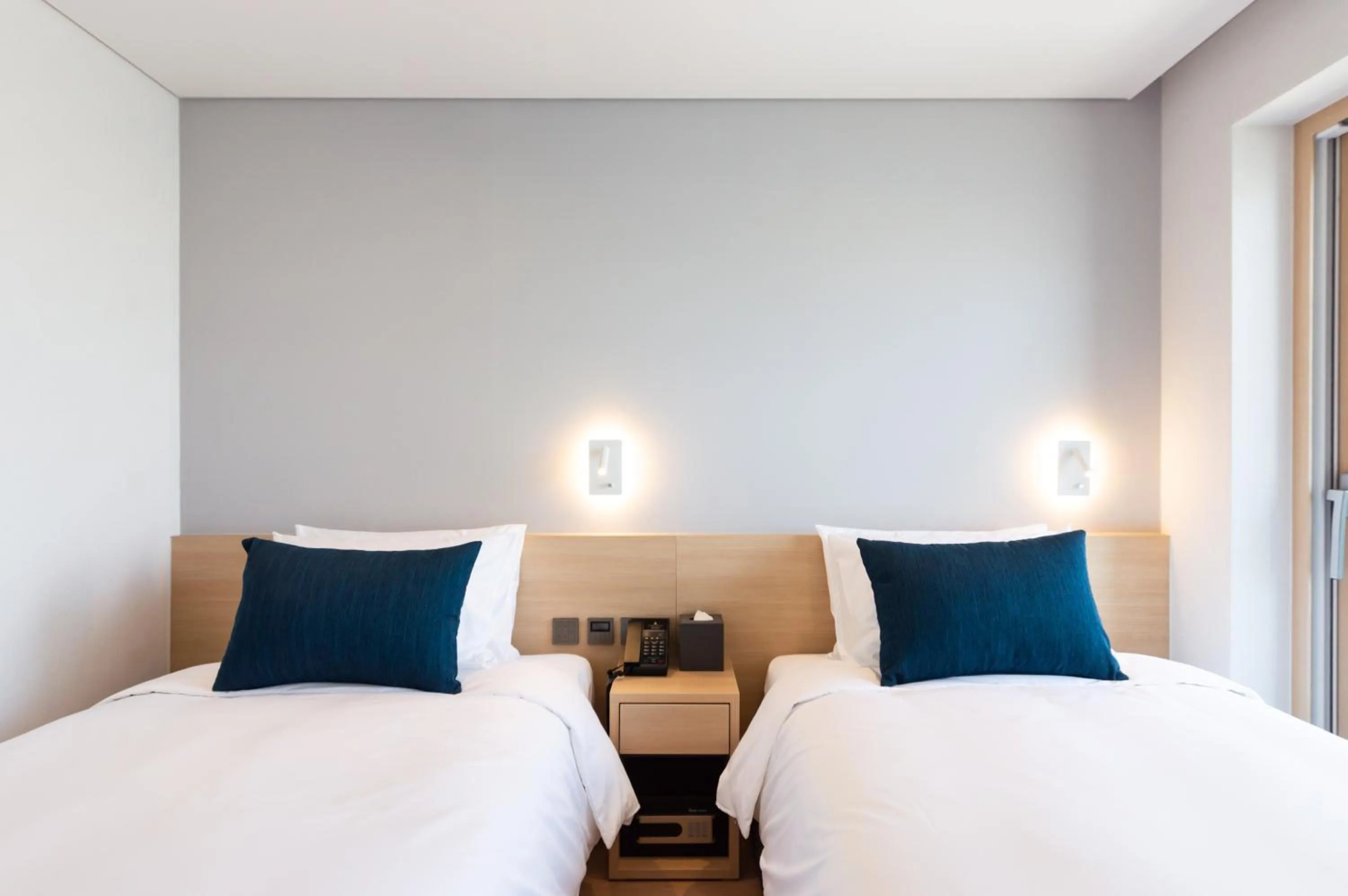 Bed in Connect Busan Hotel & Residence