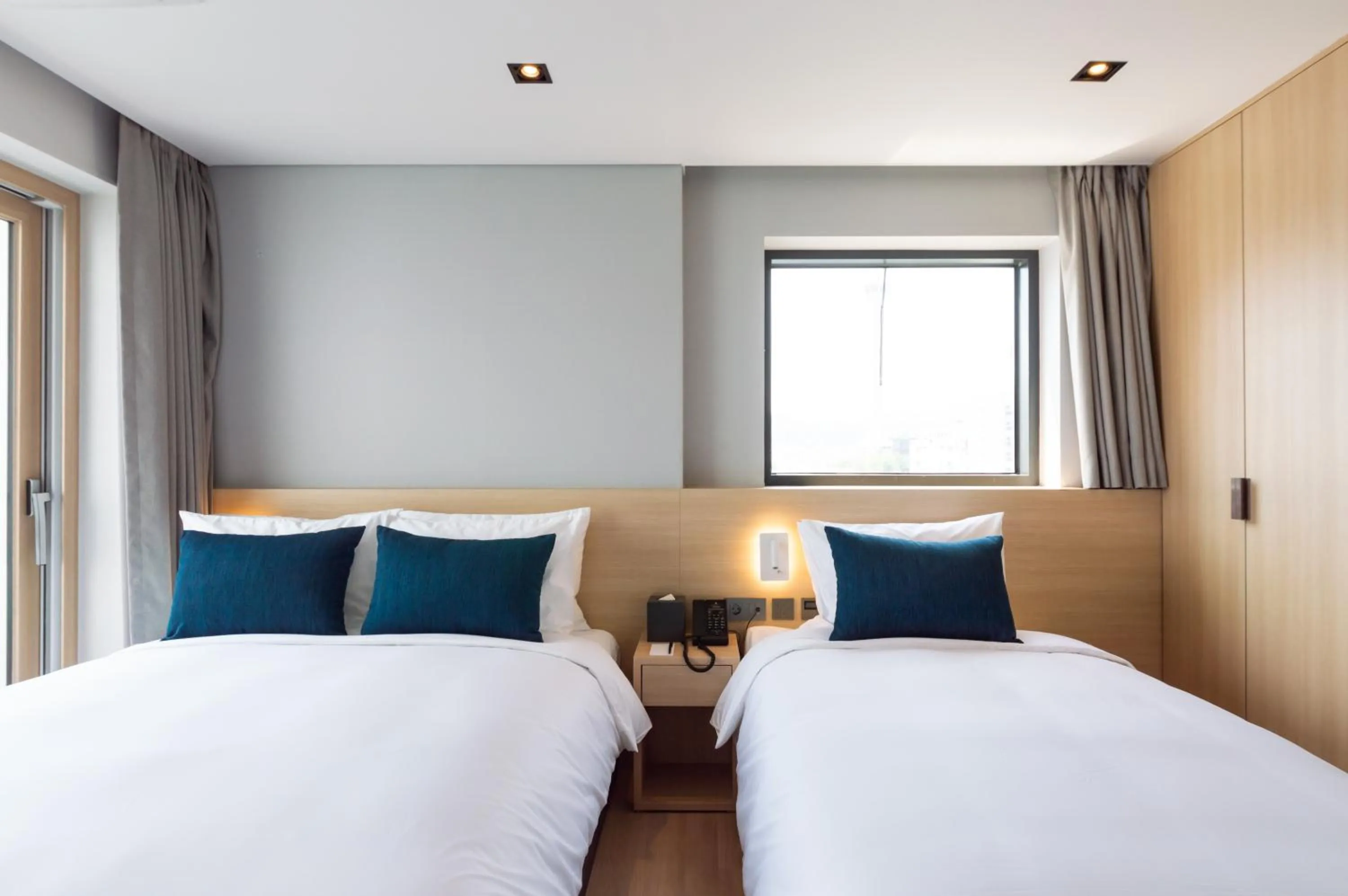 Bed in Connect Busan Hotel & Residence