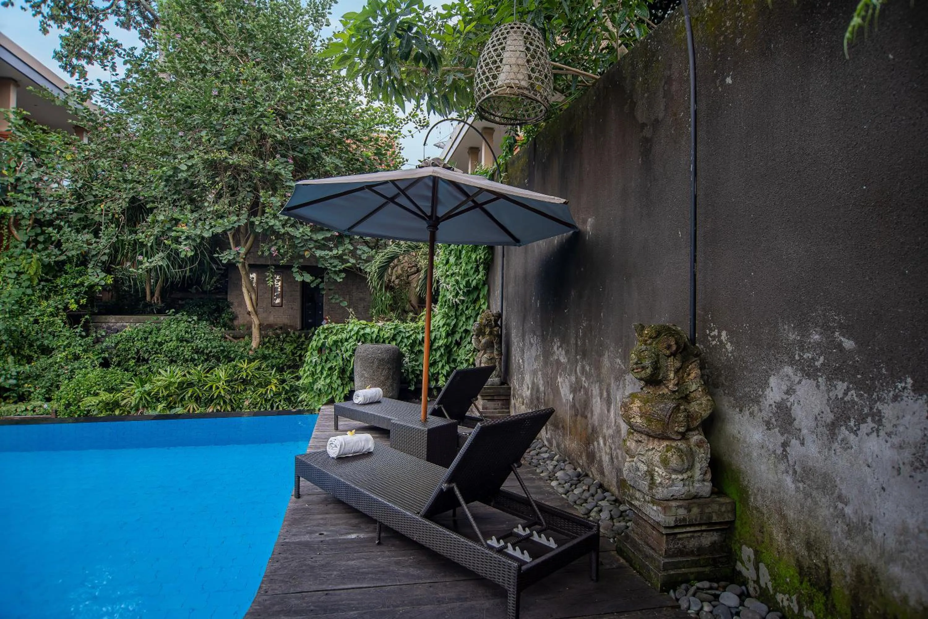 Swimming pool in Merak Village by Prasi