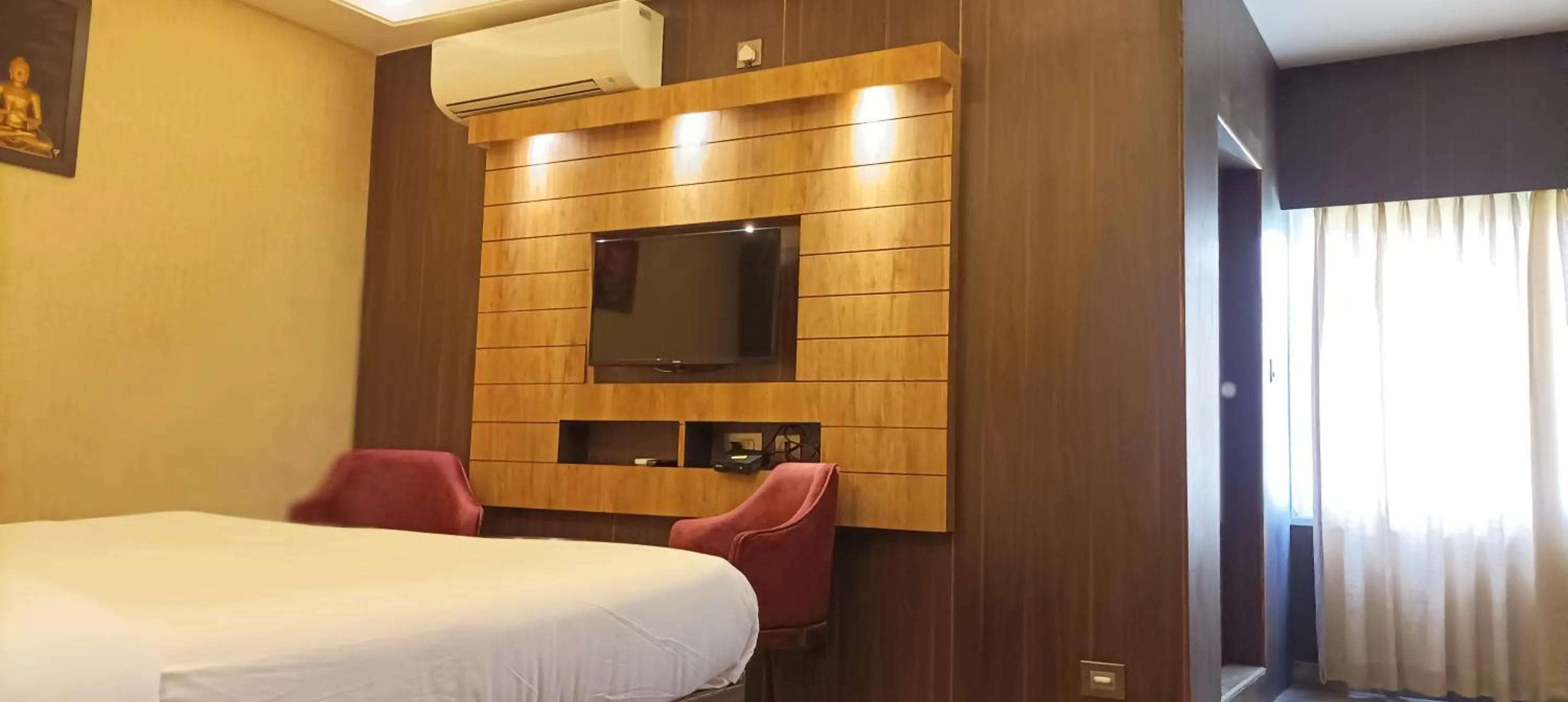 Bed in Hotel Aavas Inn