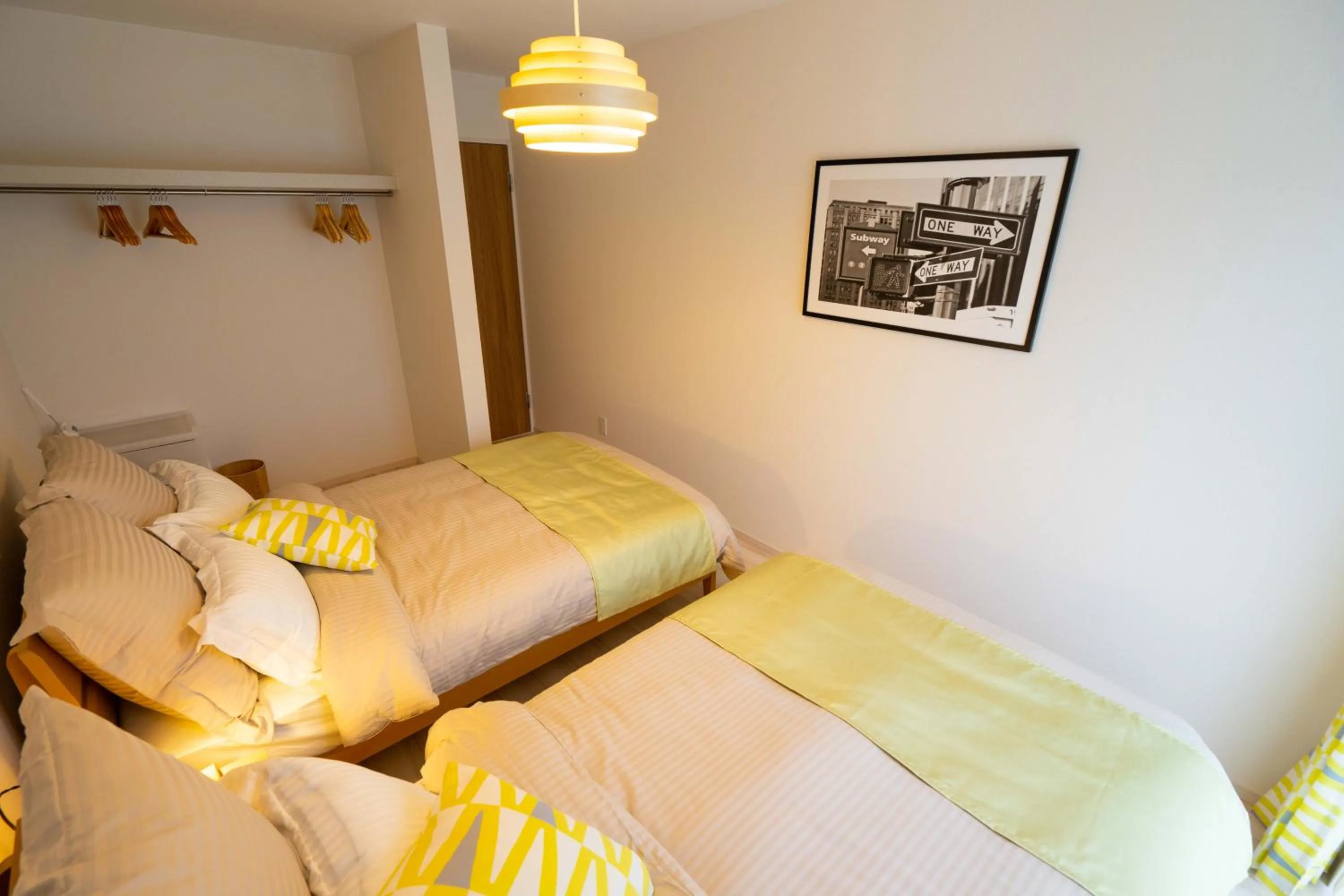 Photo of the whole room, Bed in OKINAWA BEACH HOUSE Golden Drop S