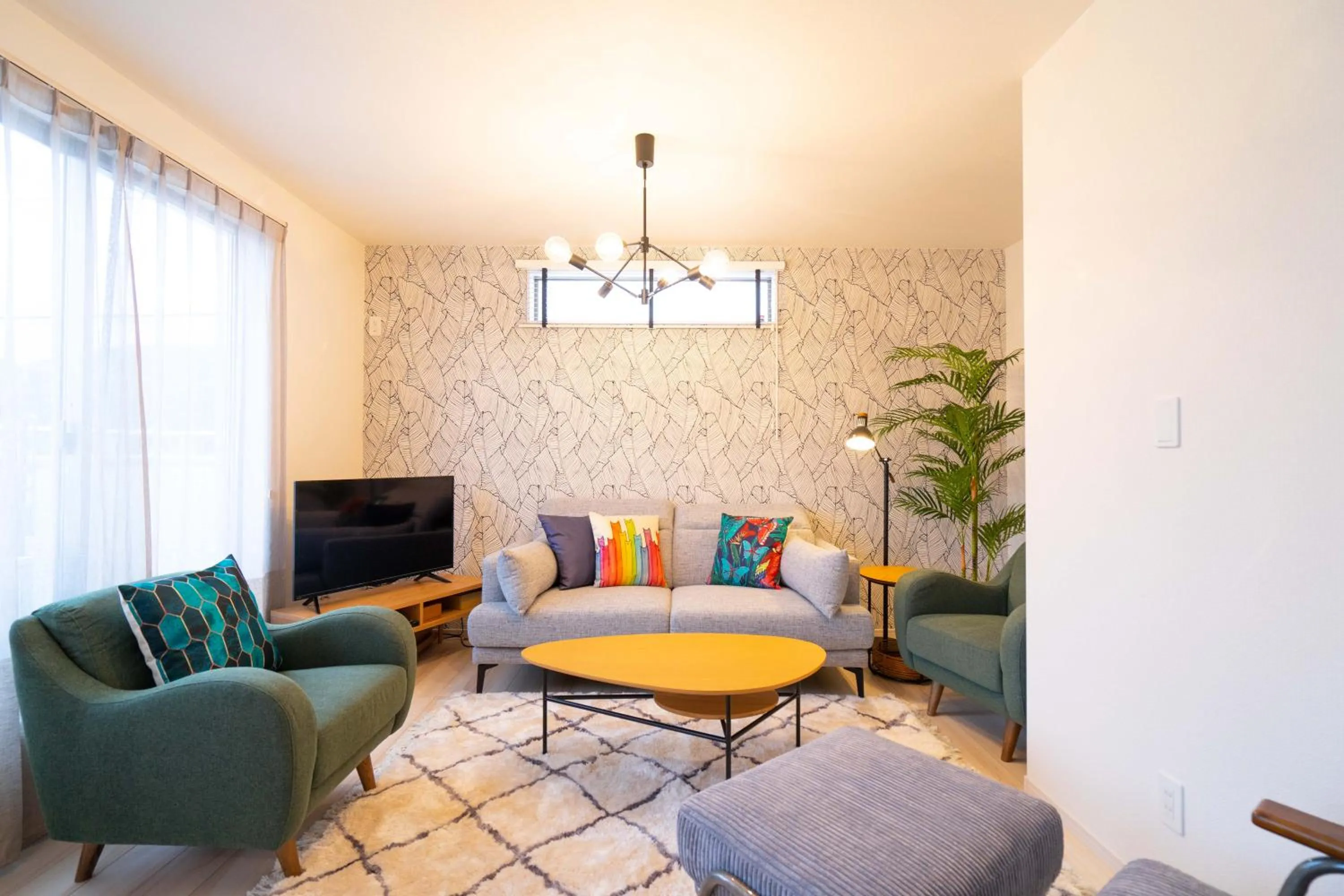 Living room in OKINAWA BEACH HOUSE Golden Drop S