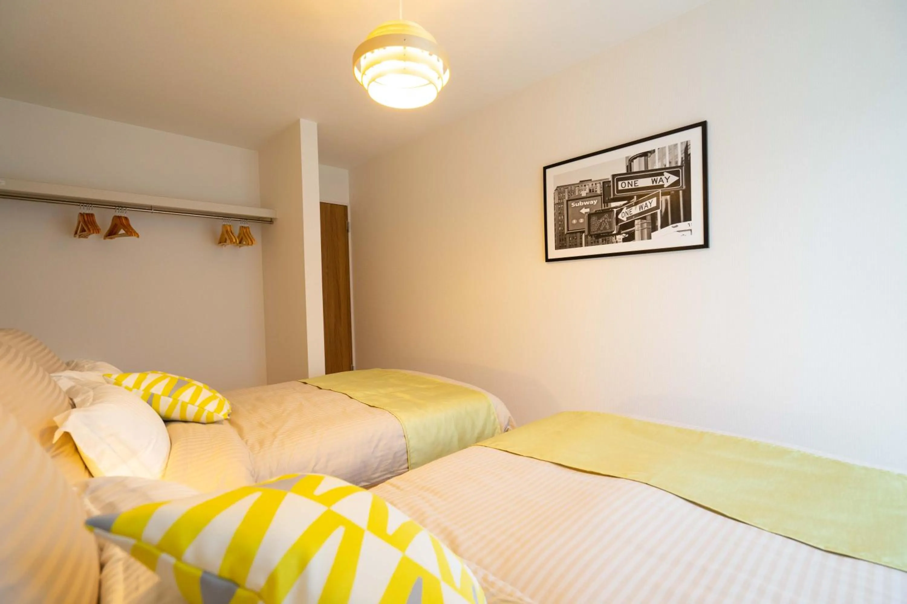 Photo of the whole room, Bed in OKINAWA BEACH HOUSE Golden Drop S