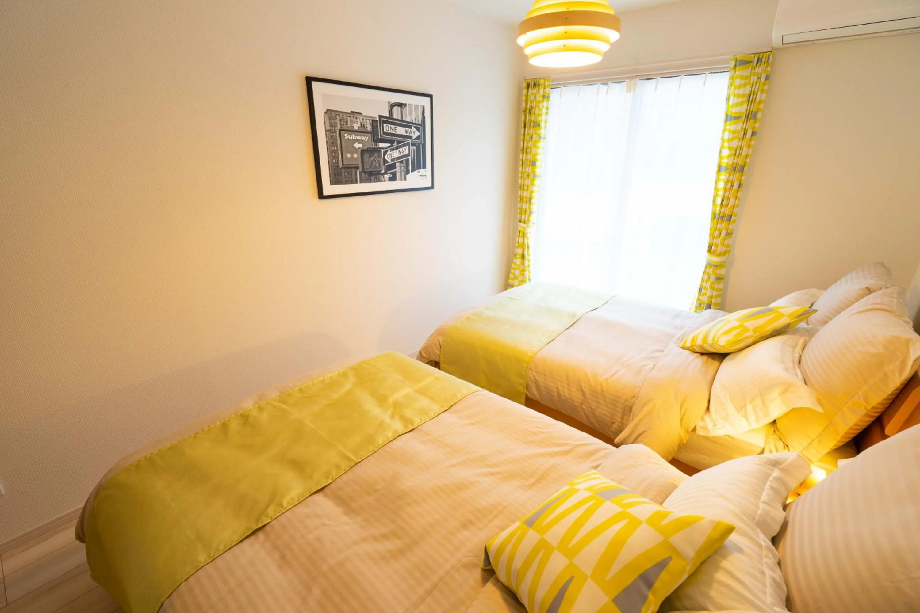Photo of the whole room, Bed in OKINAWA BEACH HOUSE Golden Drop S