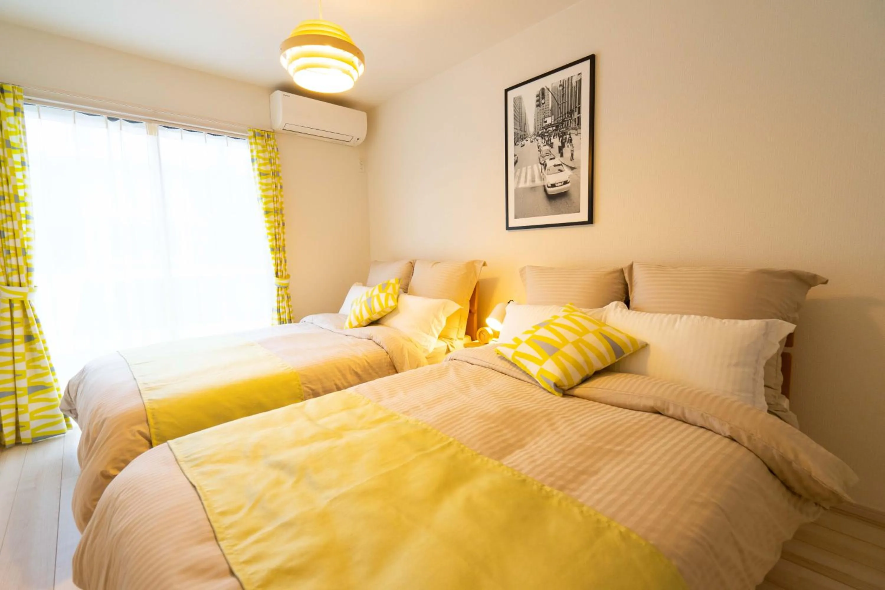 Photo of the whole room, Bed in OKINAWA BEACH HOUSE Golden Drop S