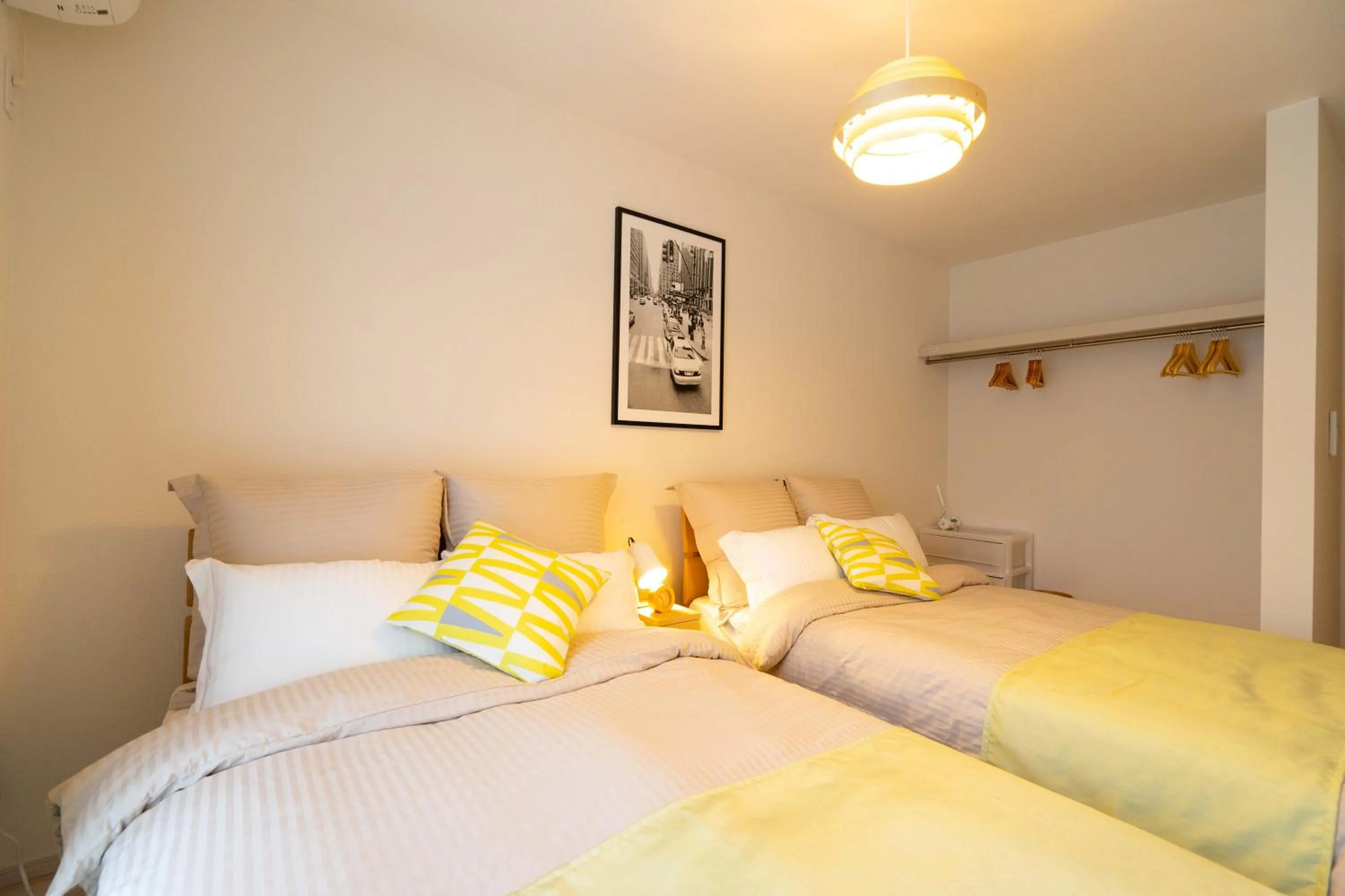 Photo of the whole room, Bed in OKINAWA BEACH HOUSE Golden Drop S