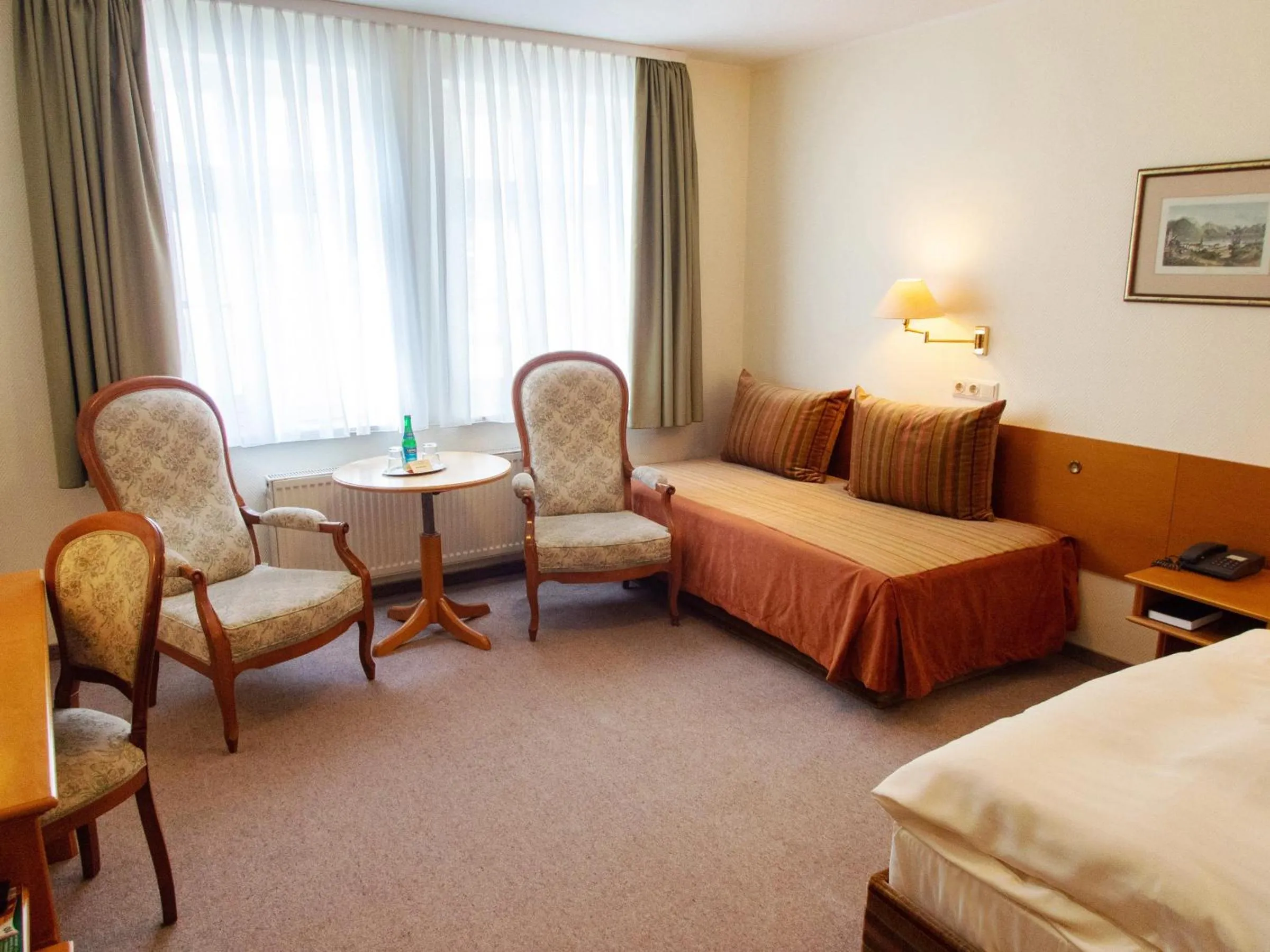 Photo of the whole room, Bed in Hotel Bürgerhof Wetzlar