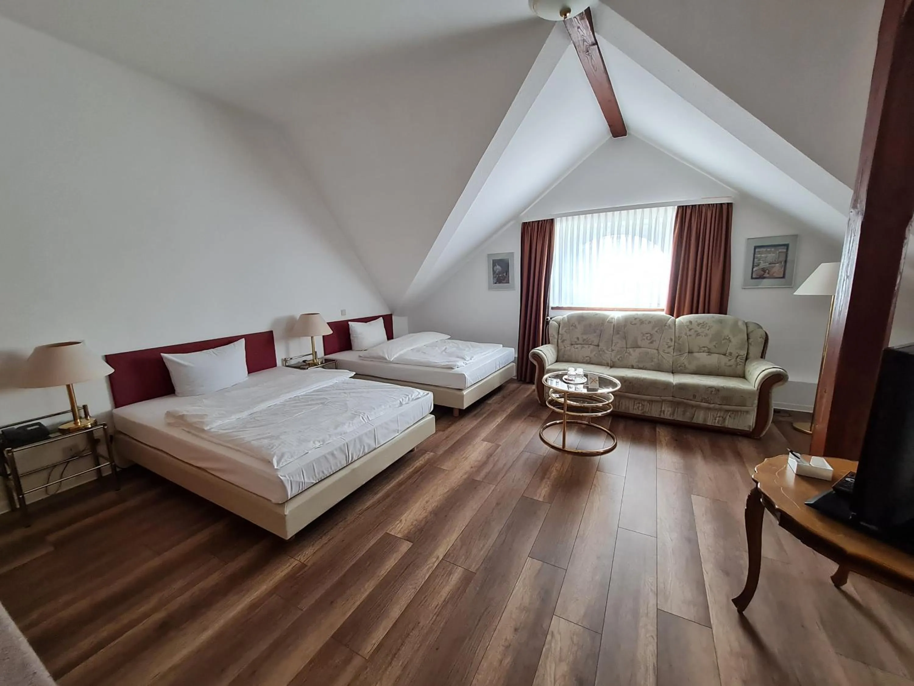 Photo of the whole room, Bed in Hotel Bürgerhof Wetzlar