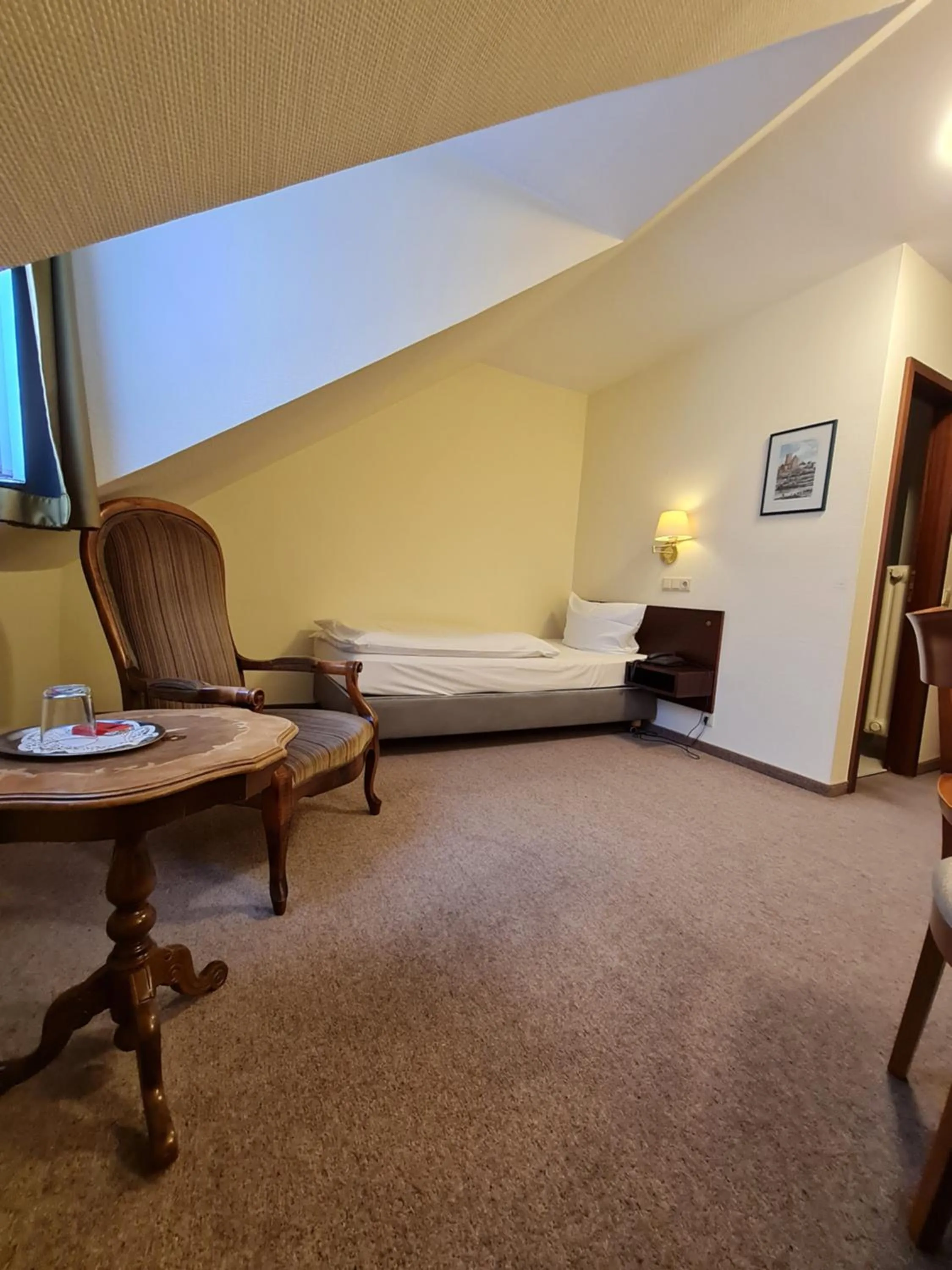 Photo of the whole room, Bed in Hotel Bürgerhof Wetzlar