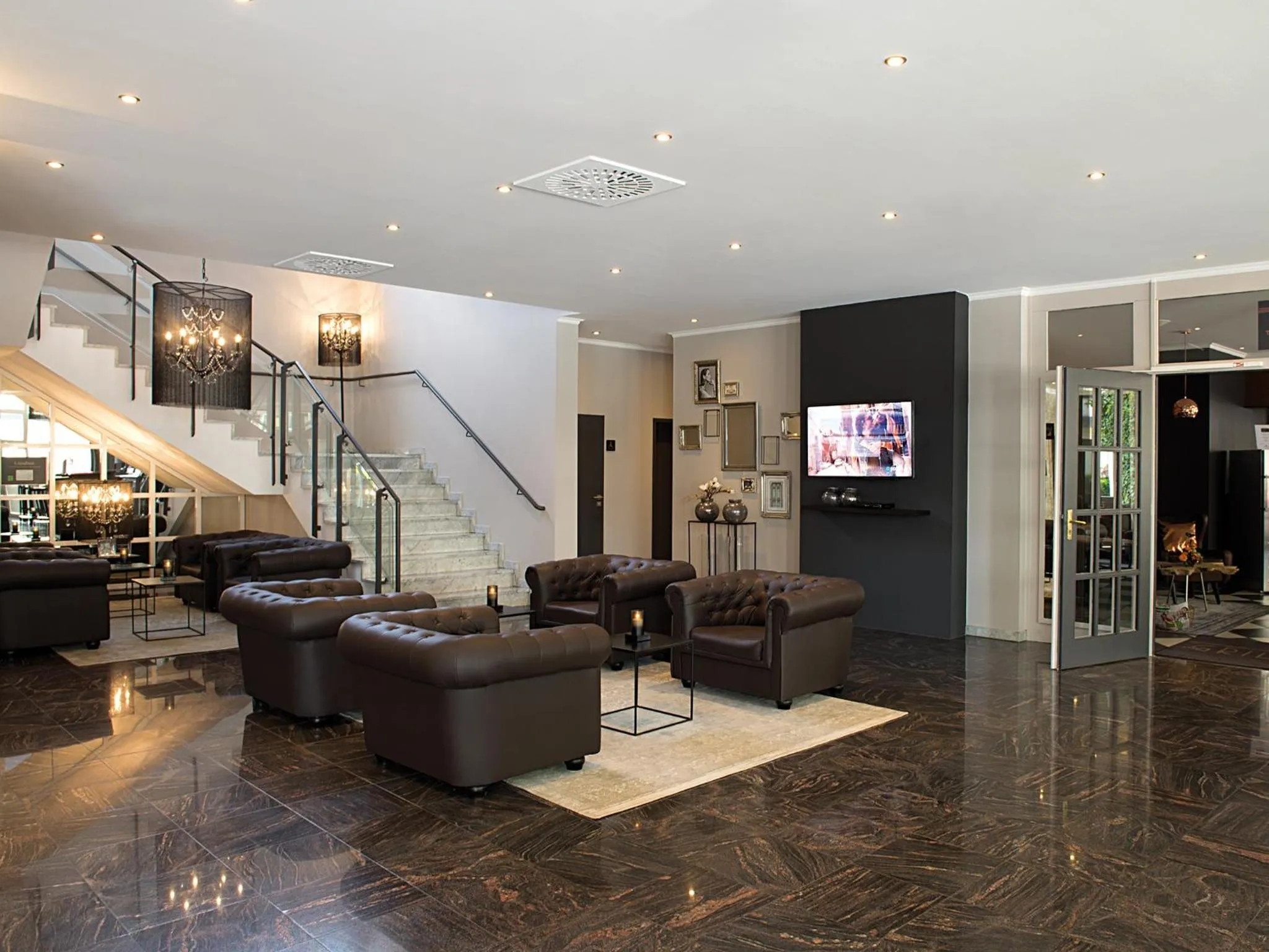 Lobby or reception in Victor's Residenz-Hotel Saarlouis