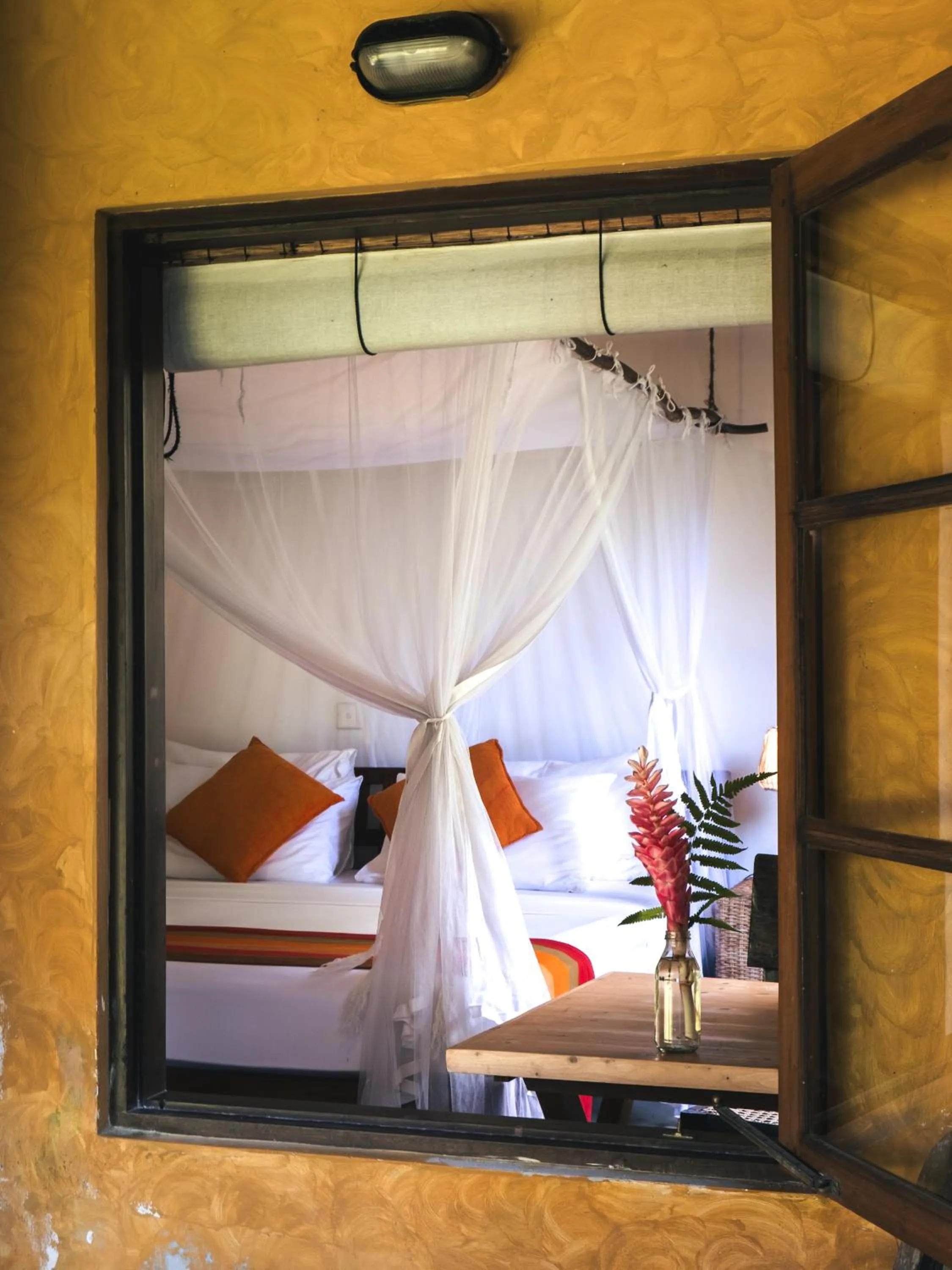 Bed in Dunes Unawatuna Hotel