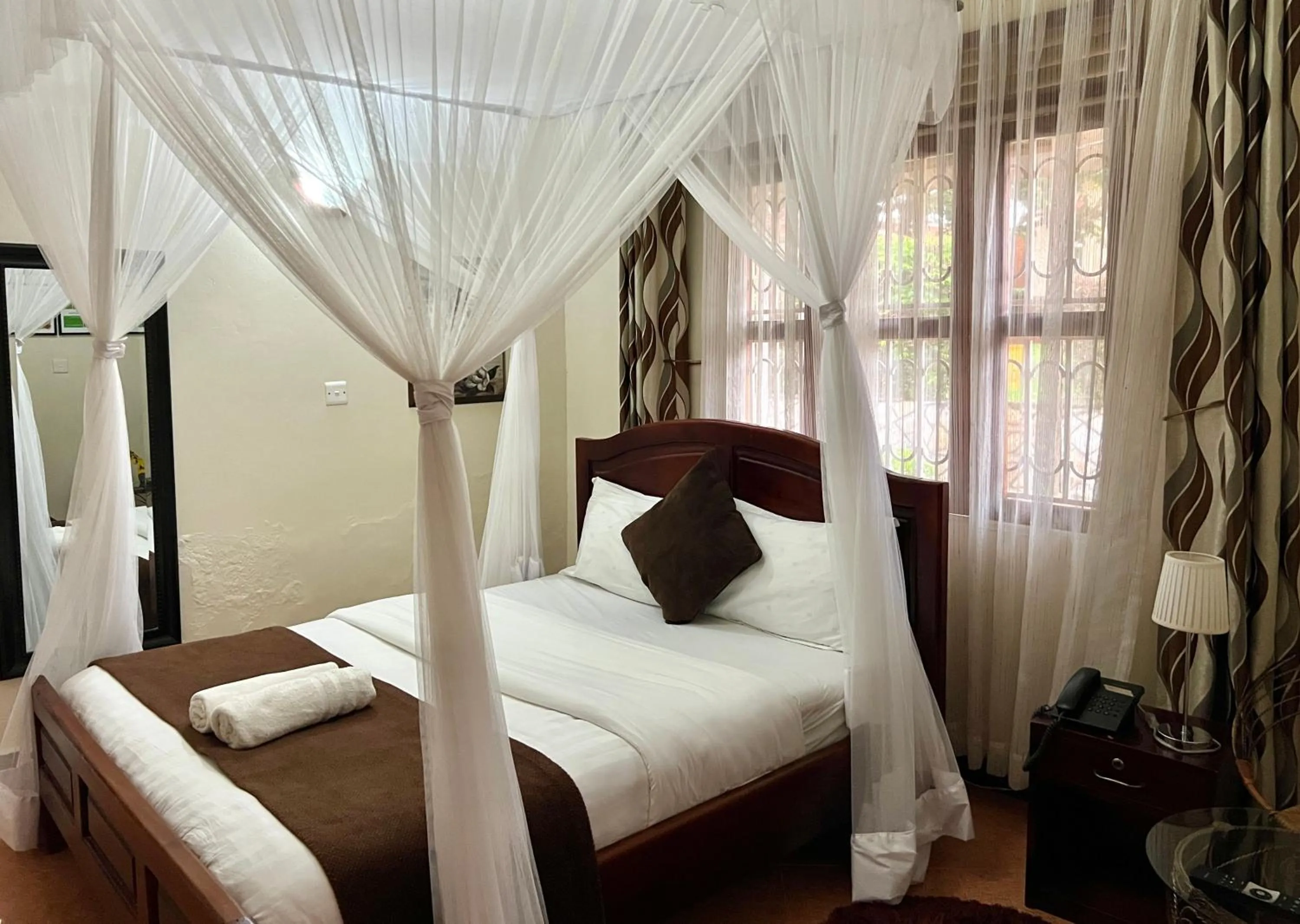 Bed in Sunset Hotel Entebbe