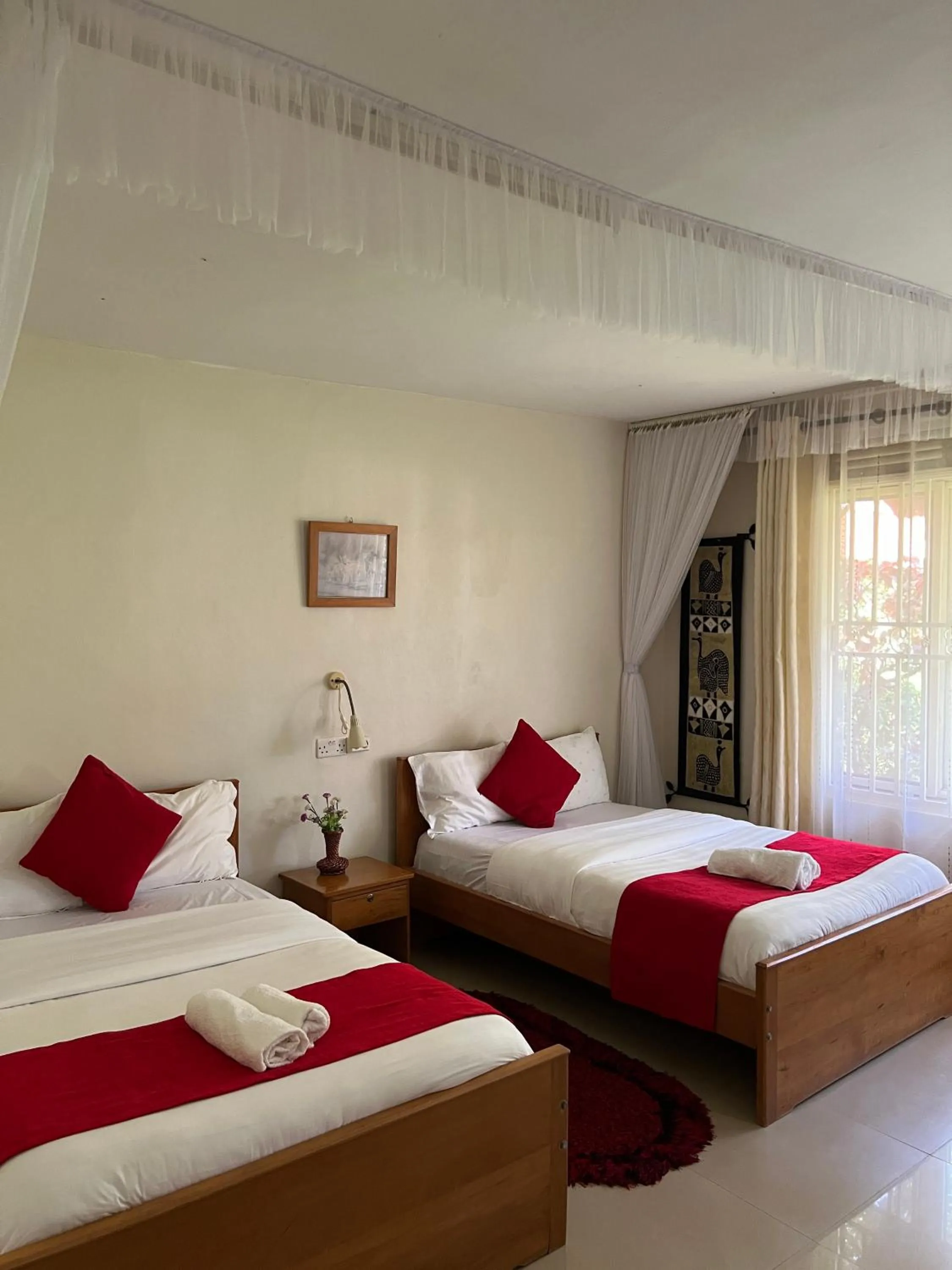 Bedroom, Bed in Sunset Hotel Entebbe