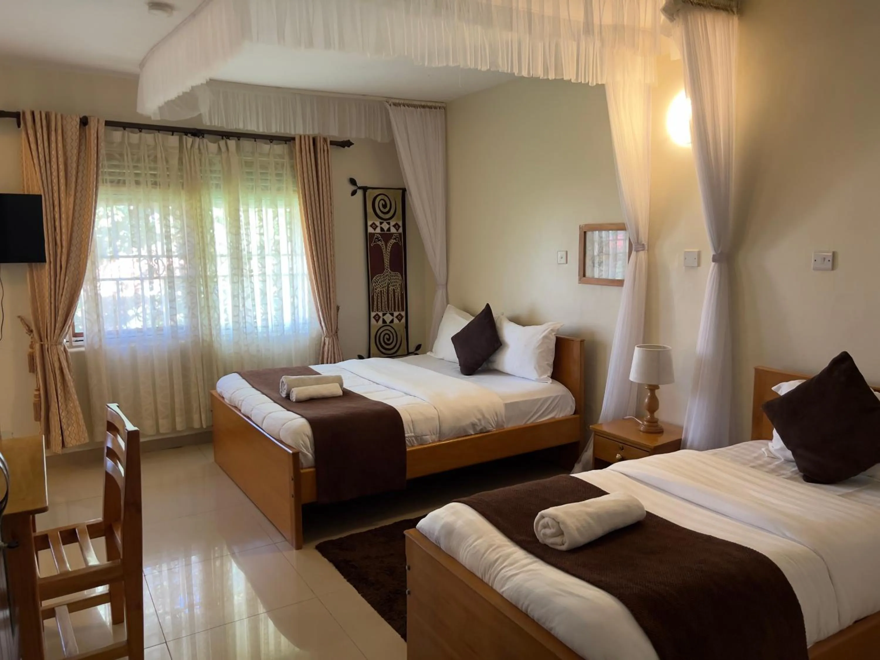 Bedroom, Bed in Sunset Hotel Entebbe