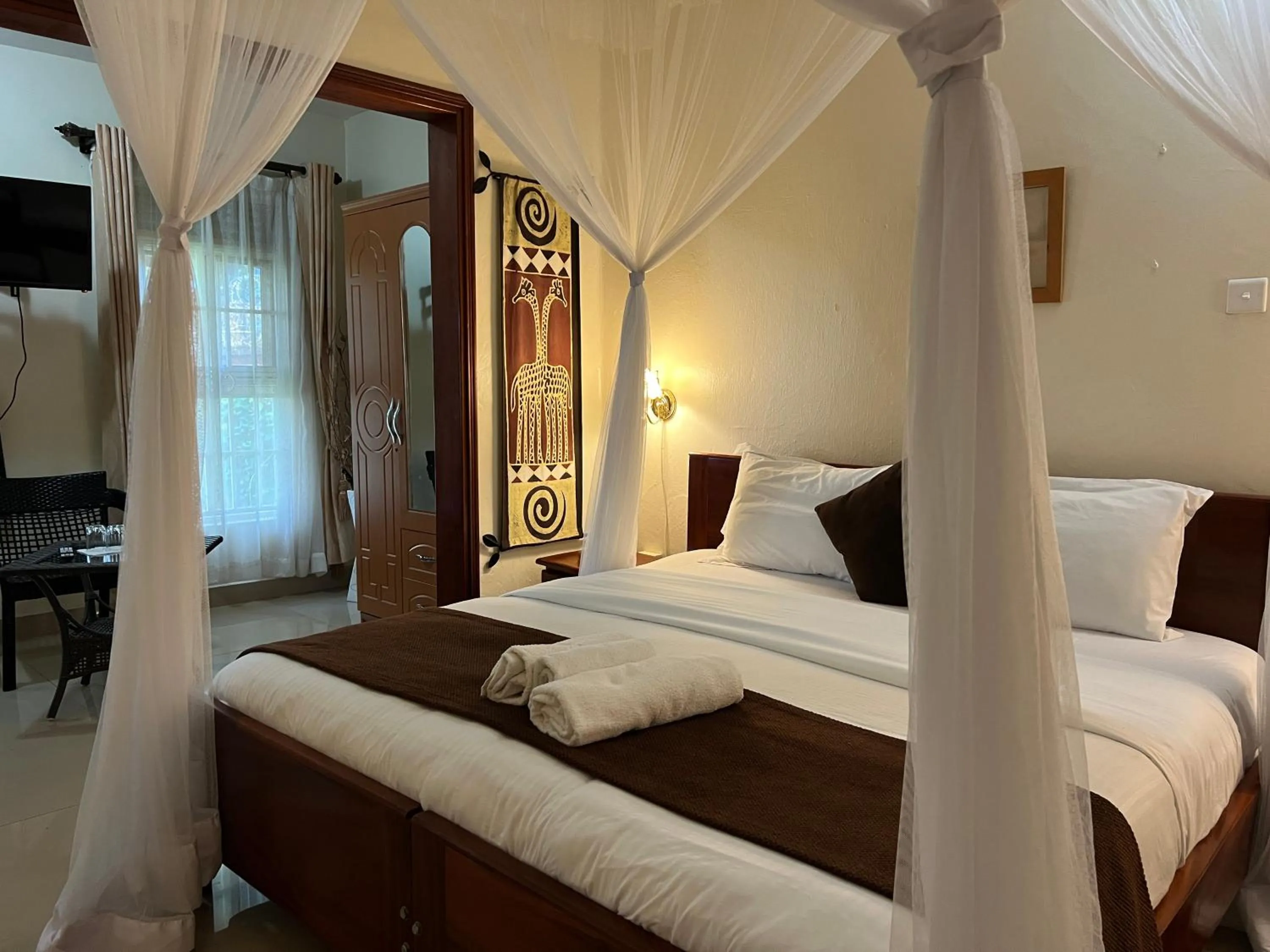 Bed in Sunset Hotel Entebbe