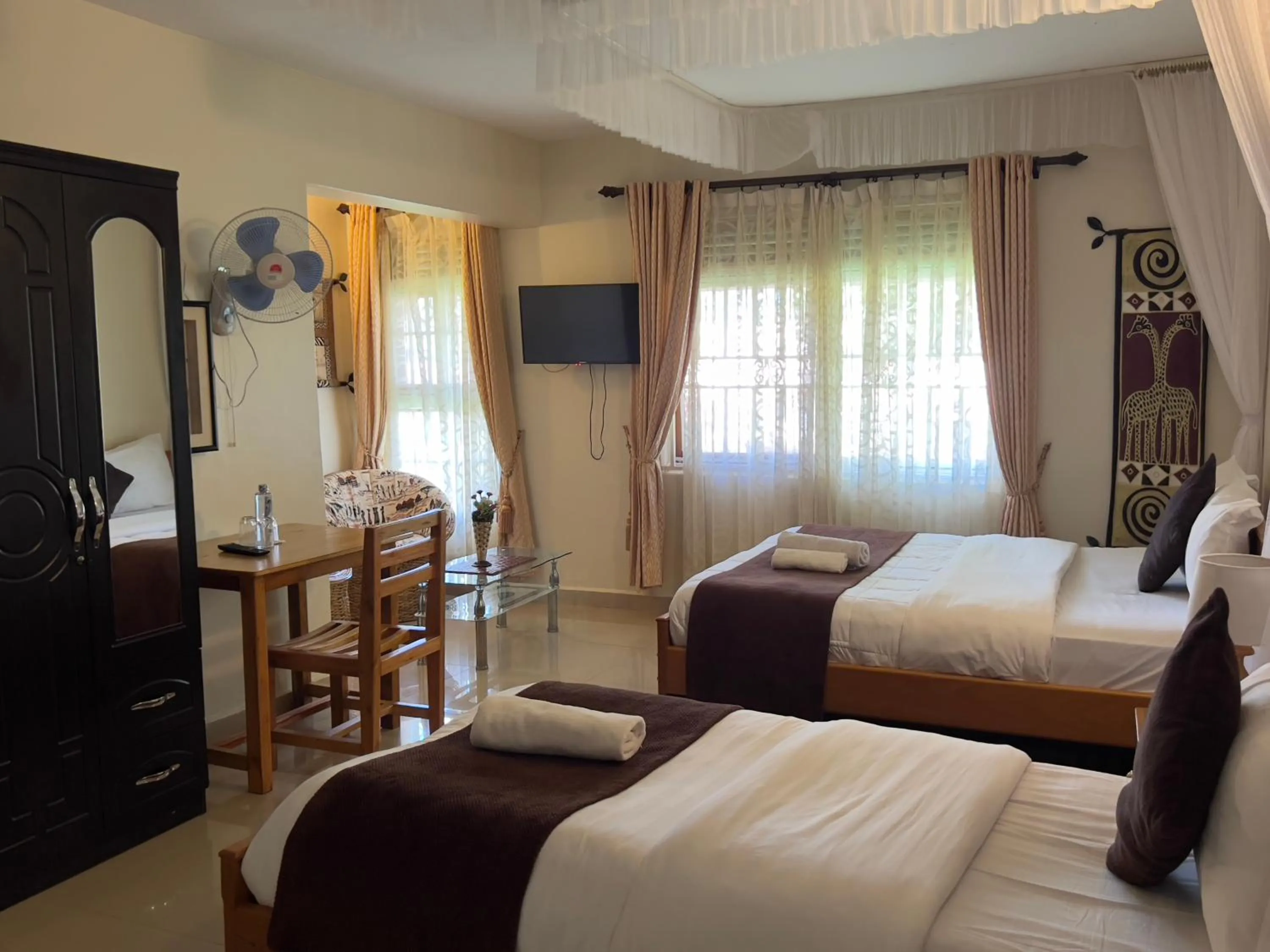 Bedroom, Bed in Sunset Hotel Entebbe