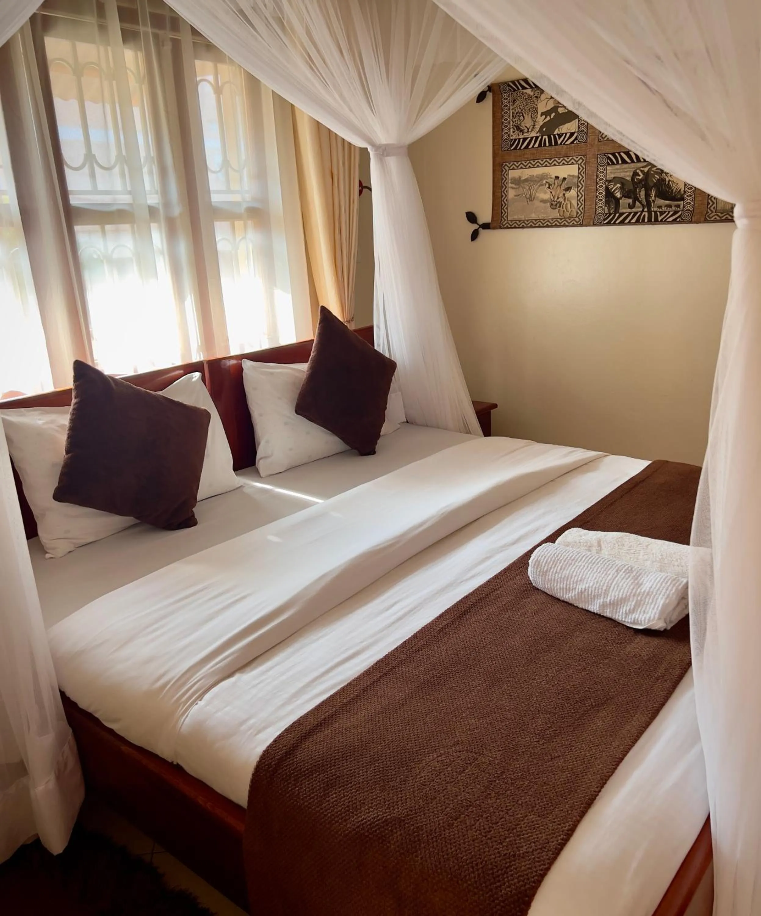 Bed in Sunset Hotel Entebbe