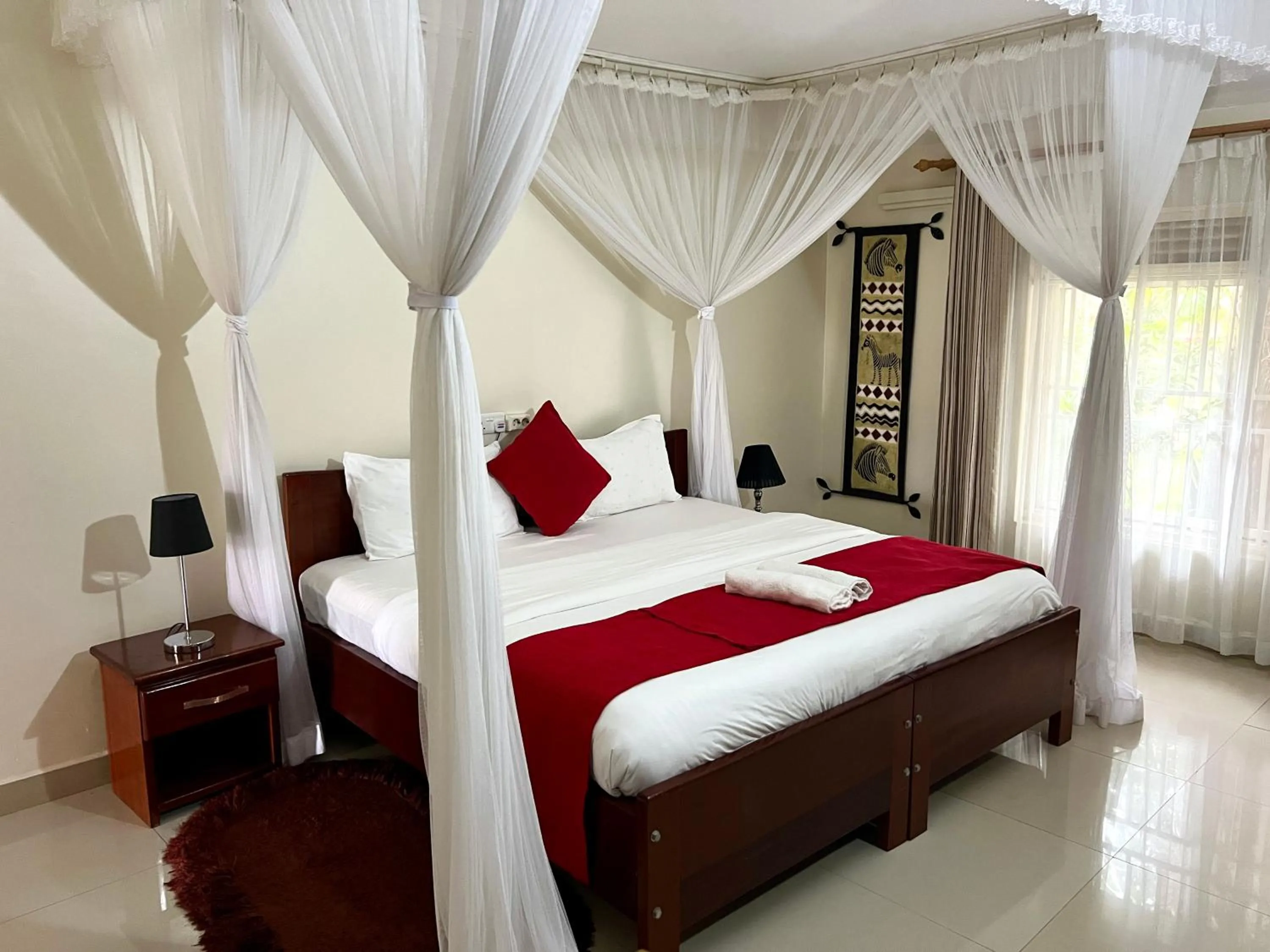 Bed in Sunset Hotel Entebbe