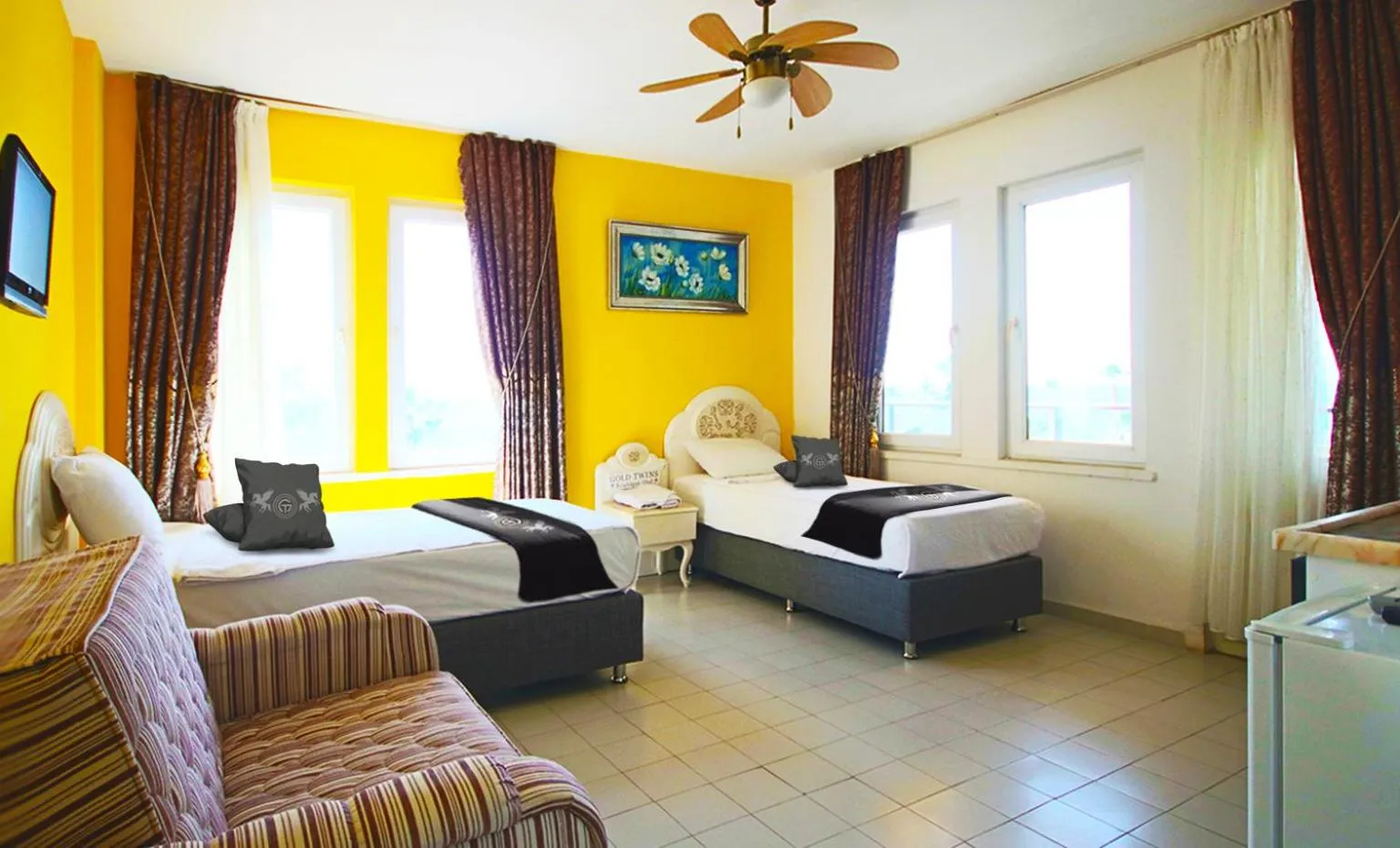 fireplace, Bed in Gold Twins Boutique Hotel