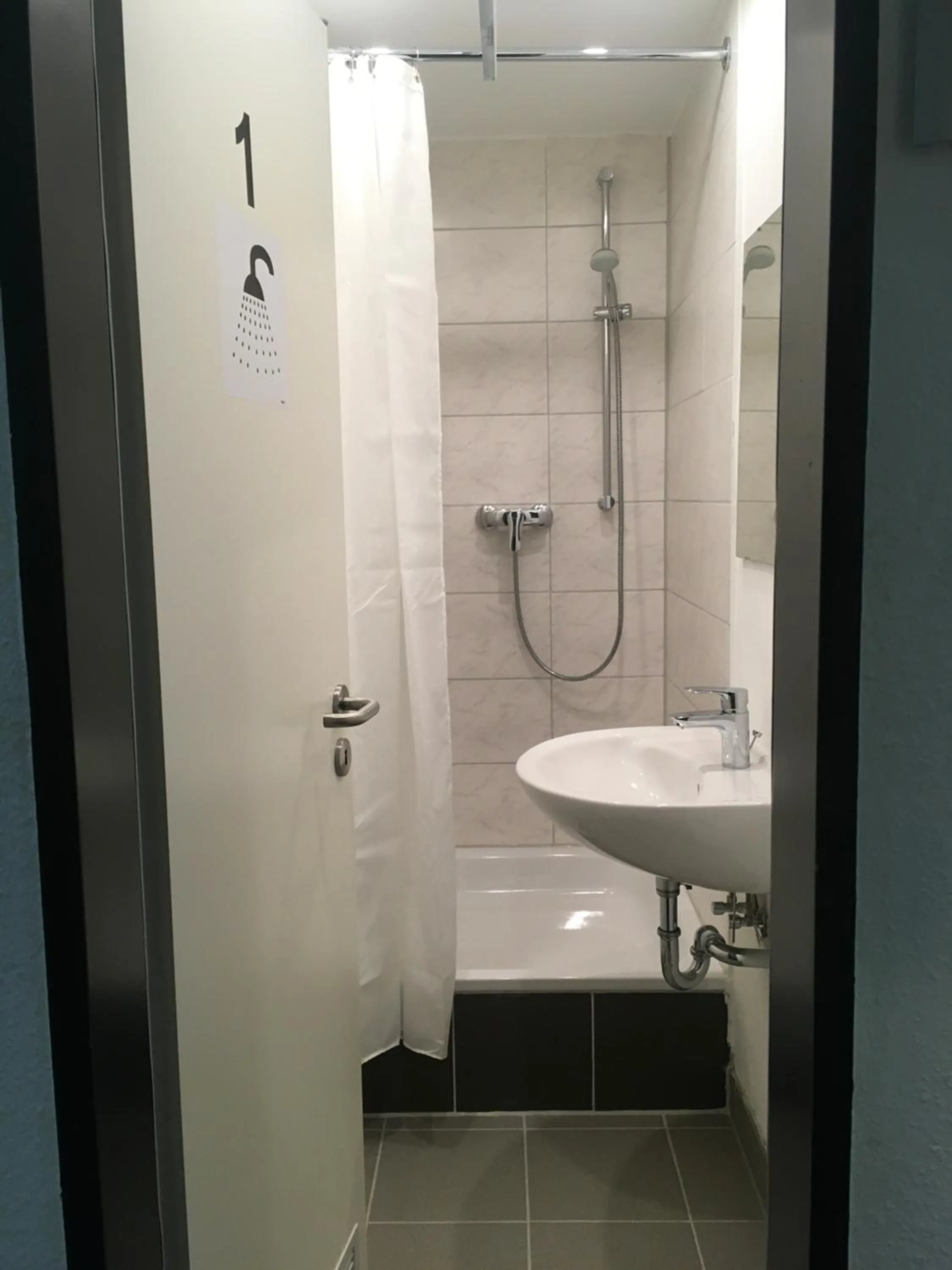 Shower in Hostel Hamm by Geronimo