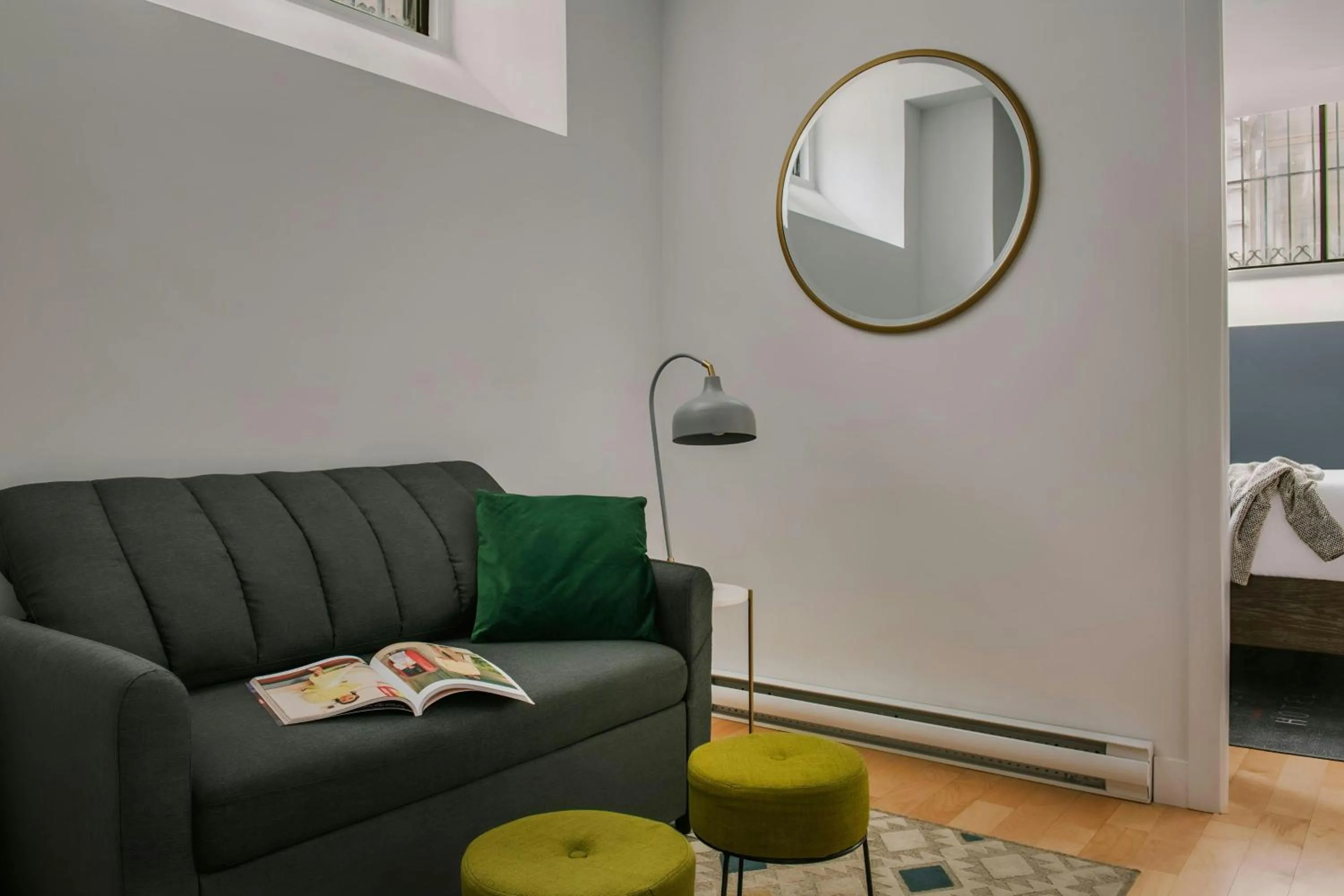 Living room, Bed in Sonder by Marriott Bonvoy Le Victoria Apartments Old Montreal