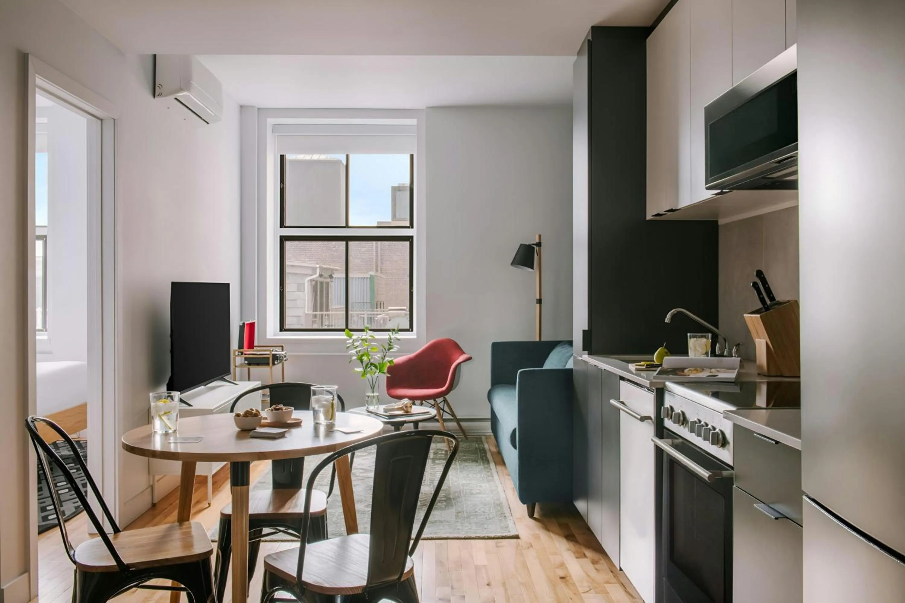 Living room in Sonder by Marriott Bonvoy Le Victoria Apartments Old Montreal