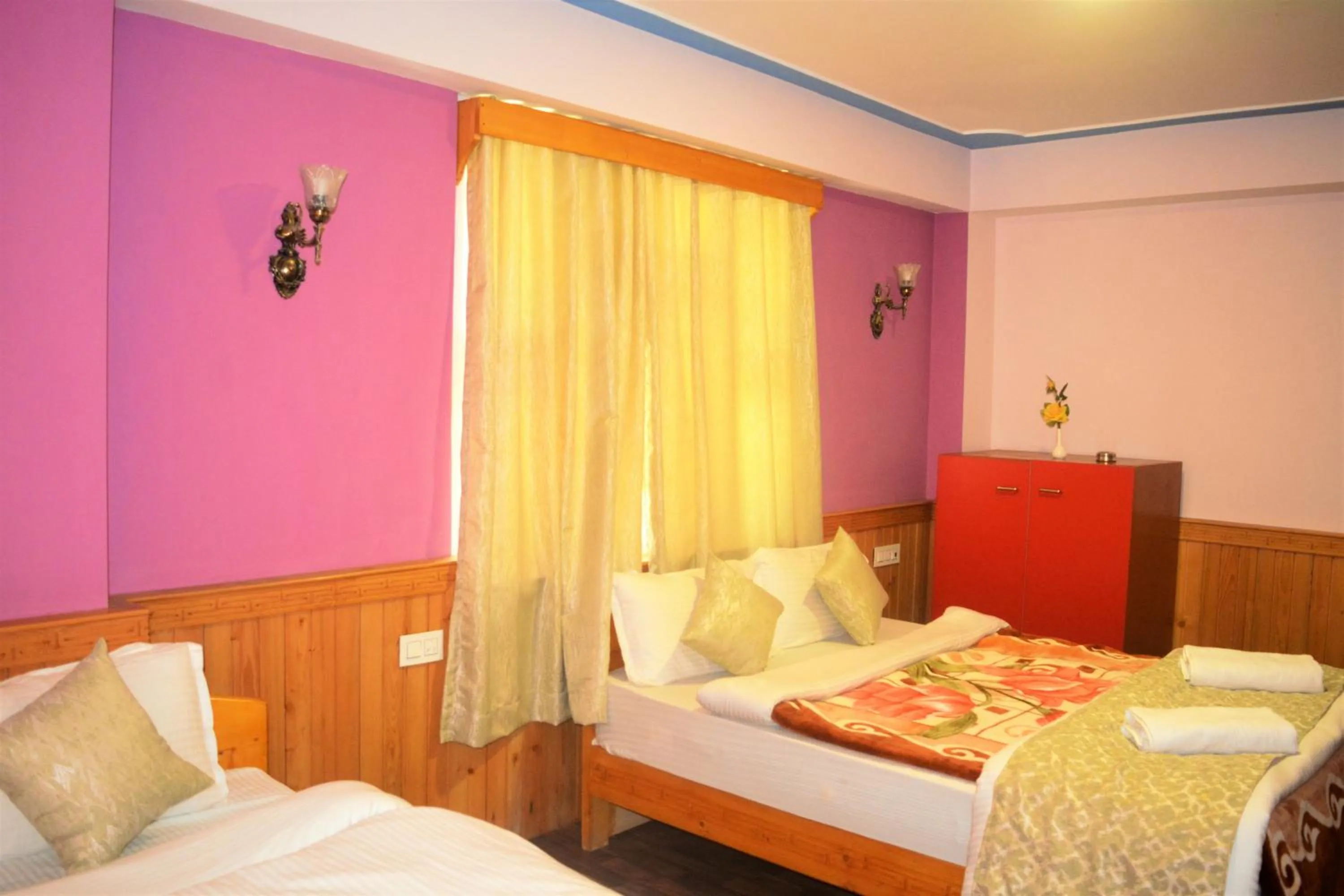 Bedroom in Rufina Lachung de'CROWN