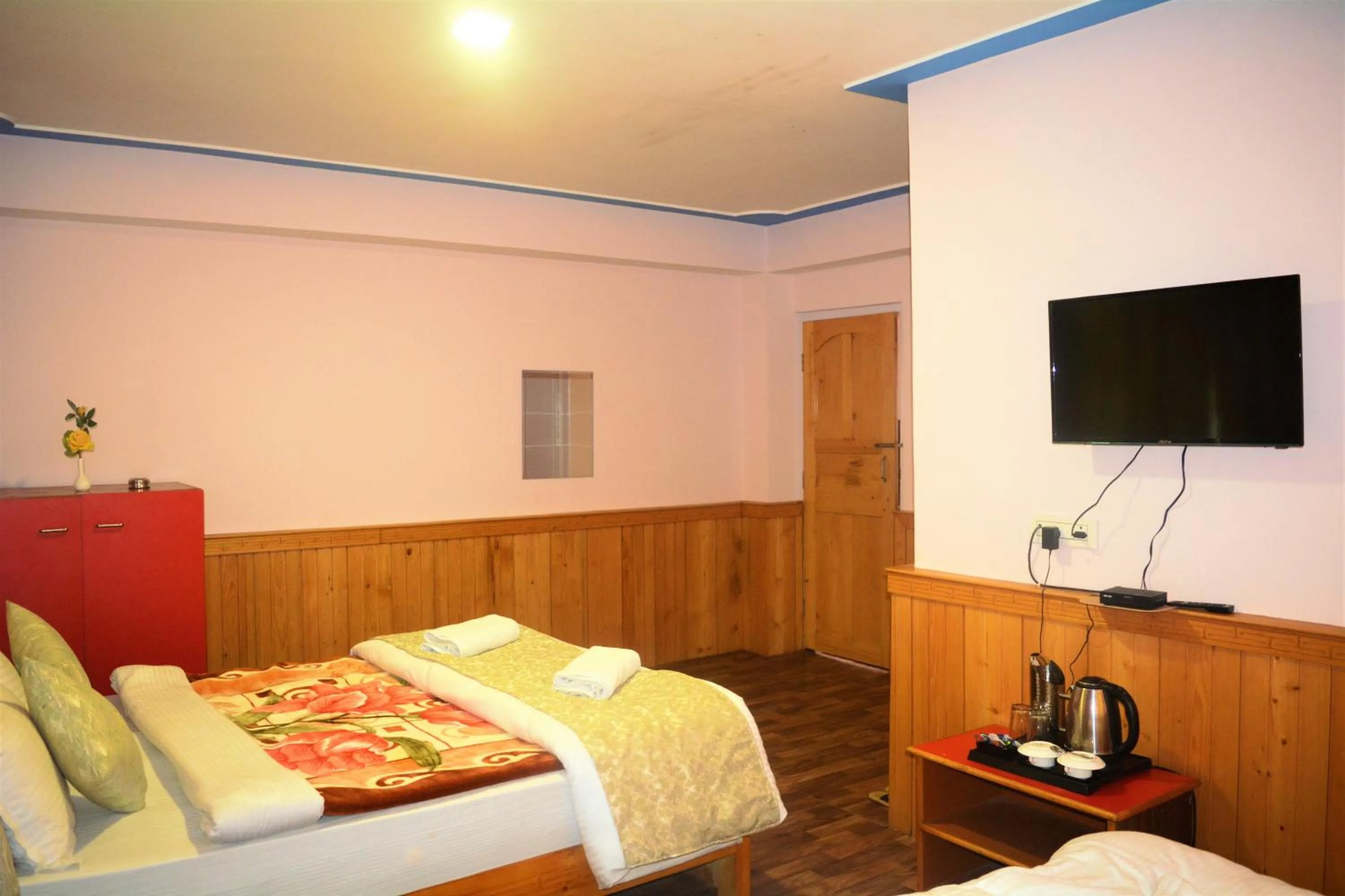 Bedroom in Rufina Lachung de'CROWN