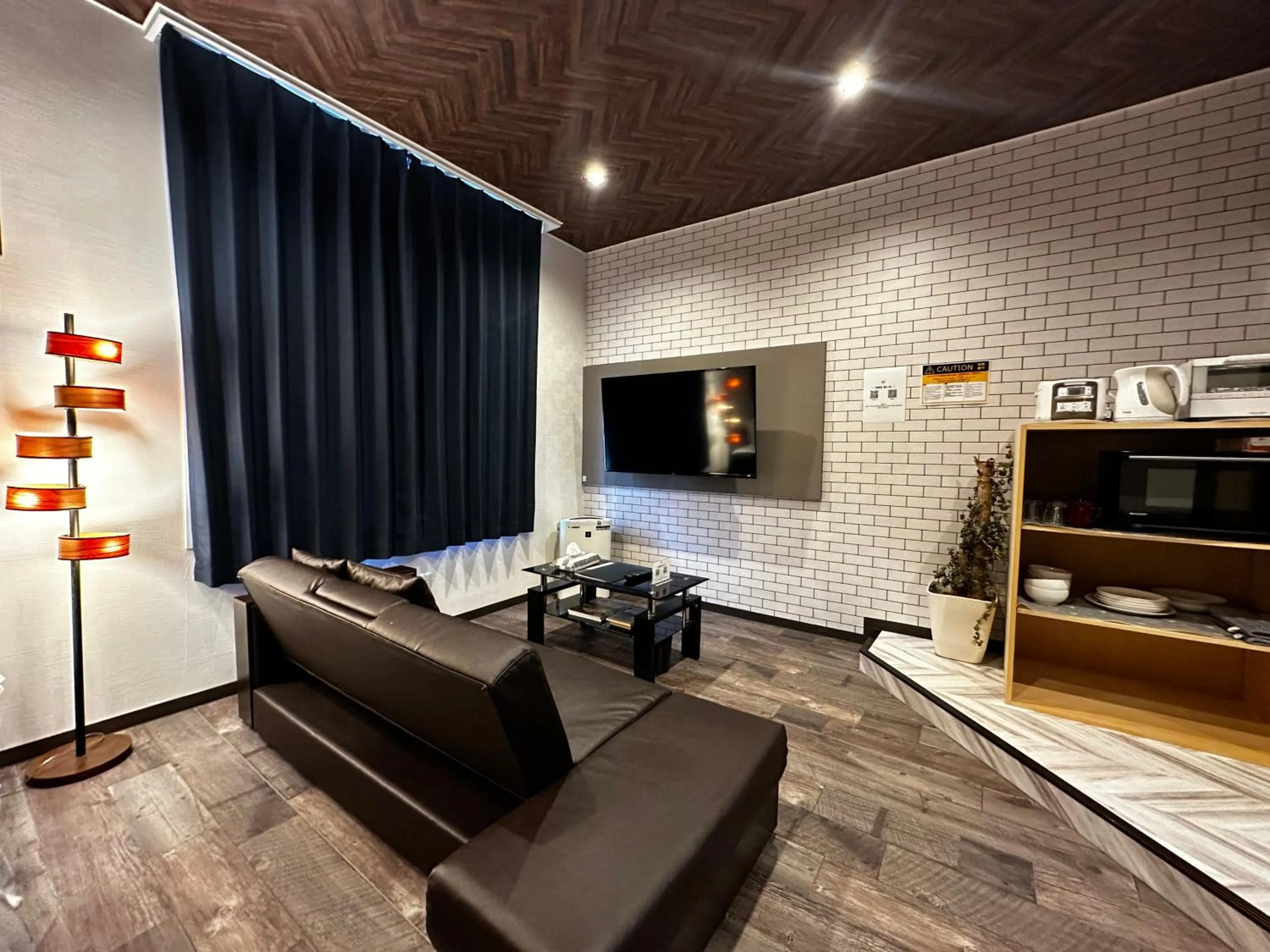 Living room in Economy Hotel Upashi