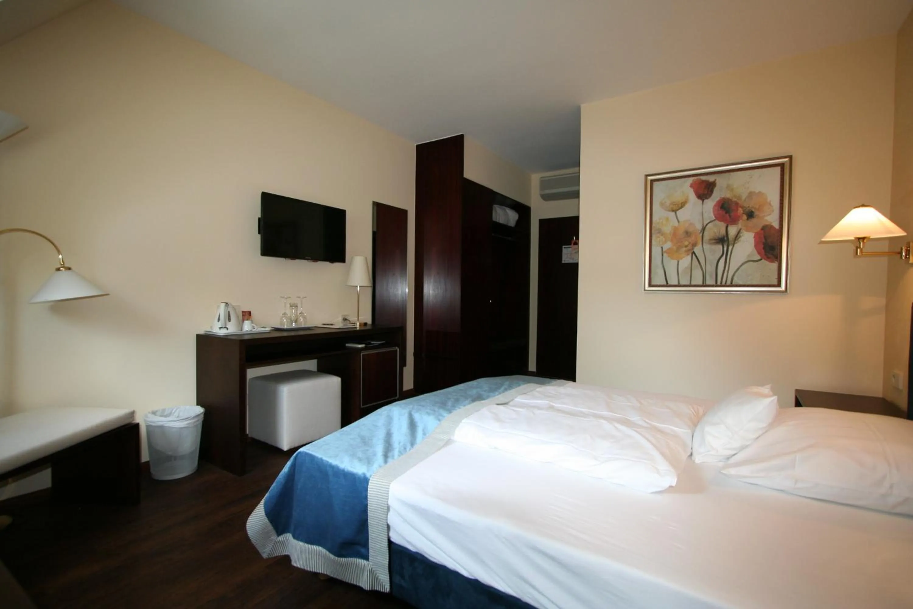 Photo of the whole room, Bed in Central Hotel