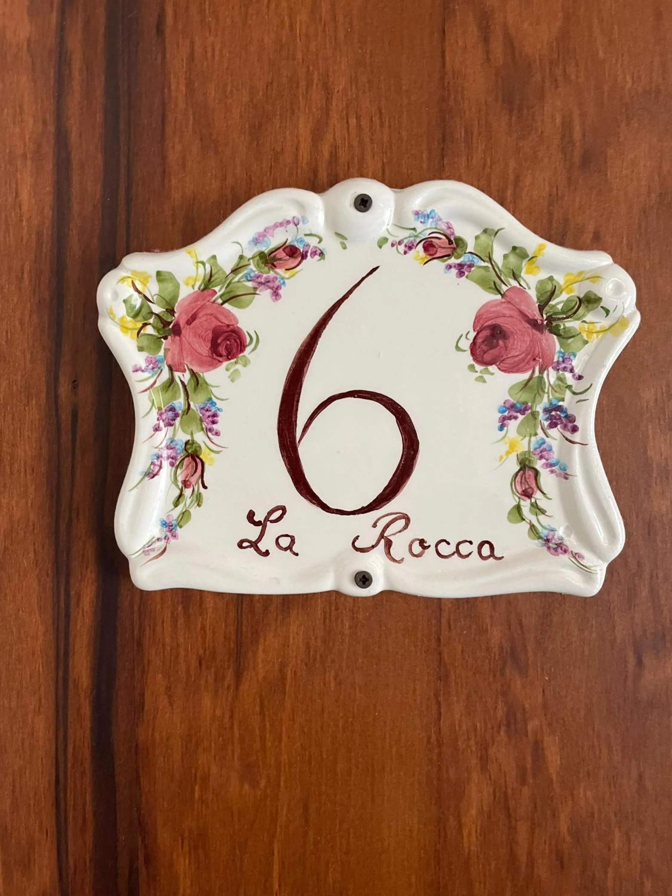 Property logo or sign in La Rocca