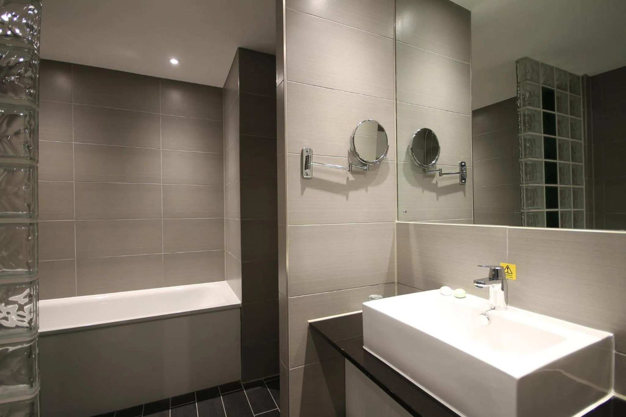Bathroom in Holiday Inn Huntingdon Racecourse by IHG