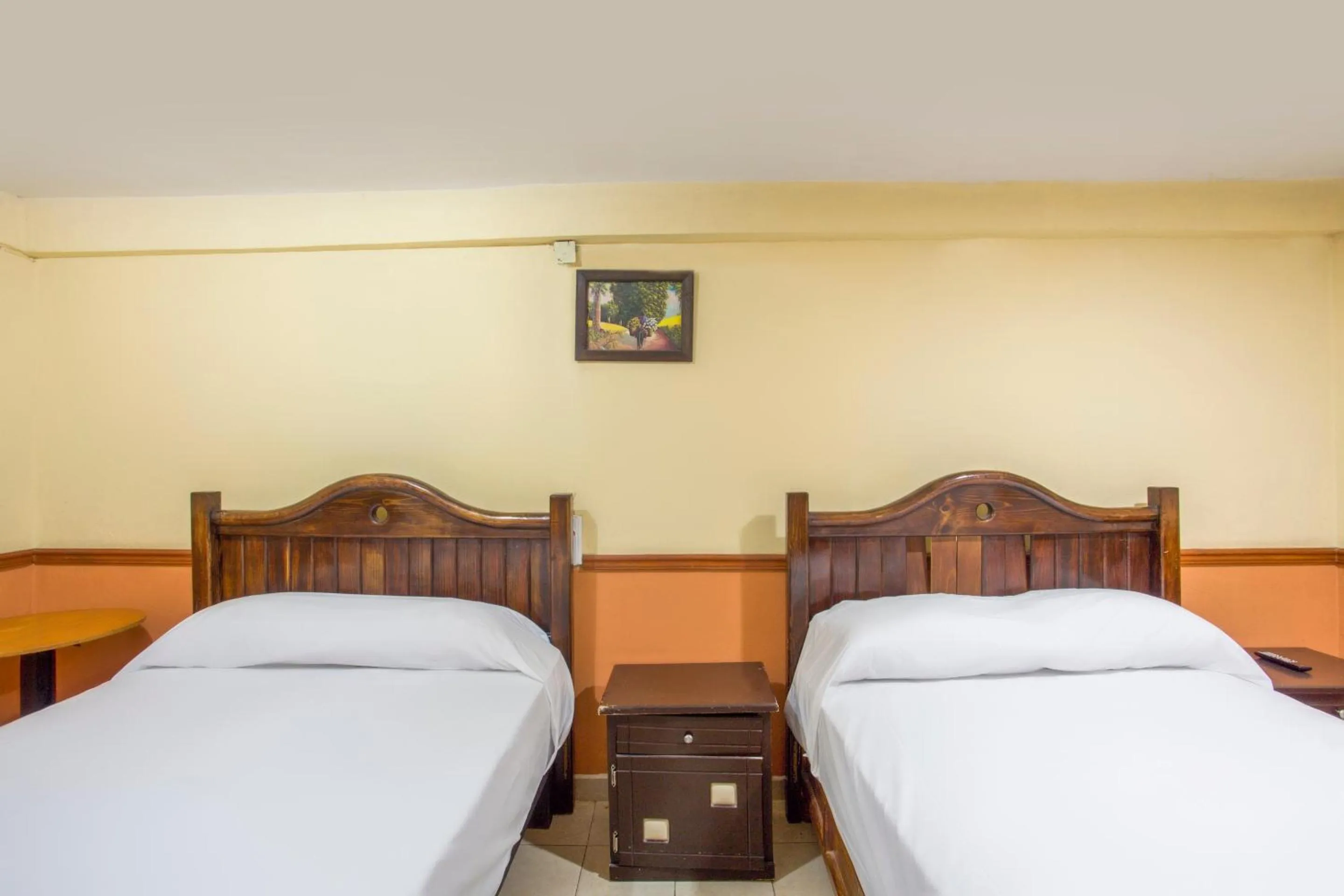 Bedroom, Bed in OYO Hotel San Agustin