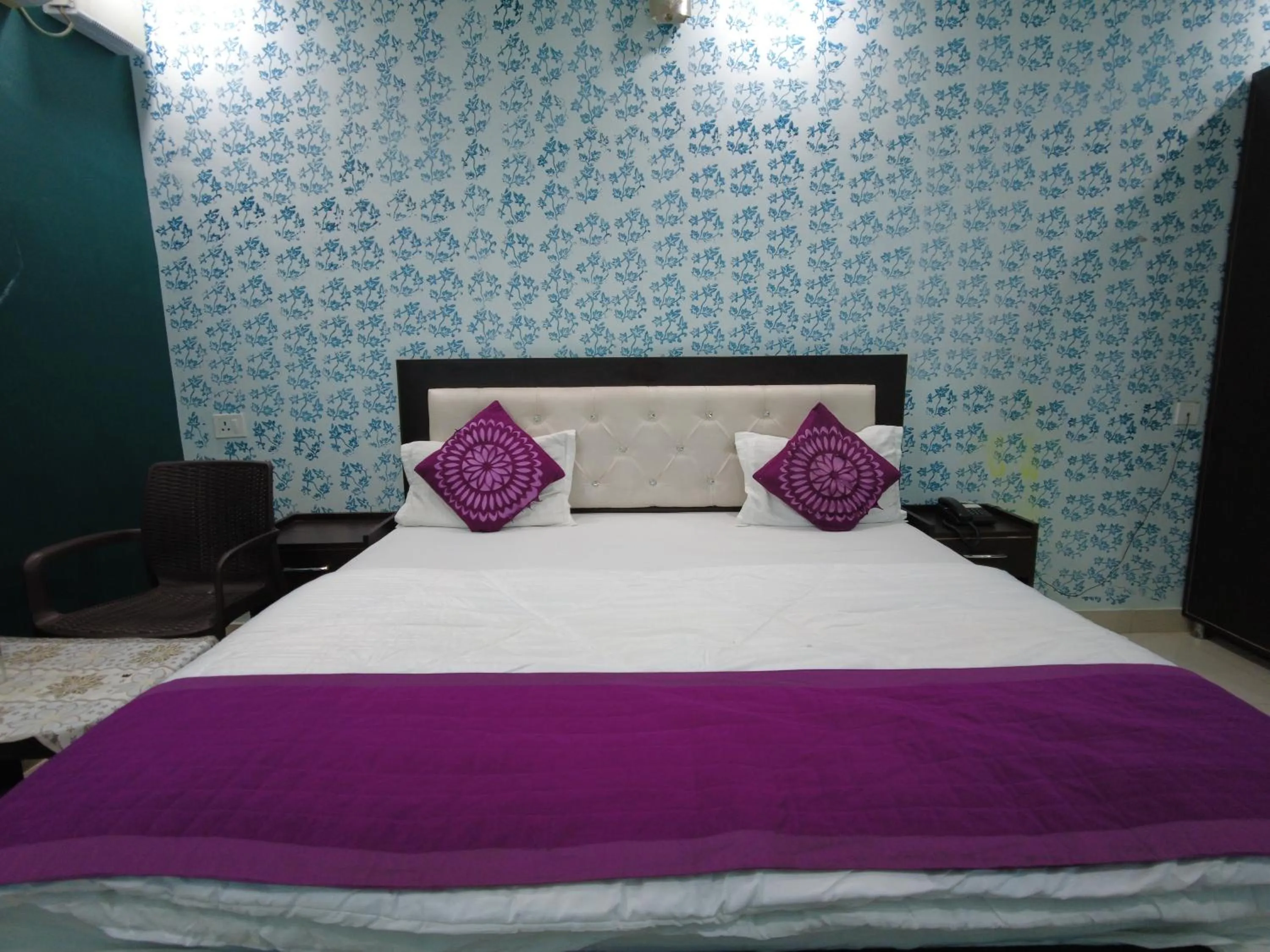 Bed in Hotel Dev Bhoomi Inn