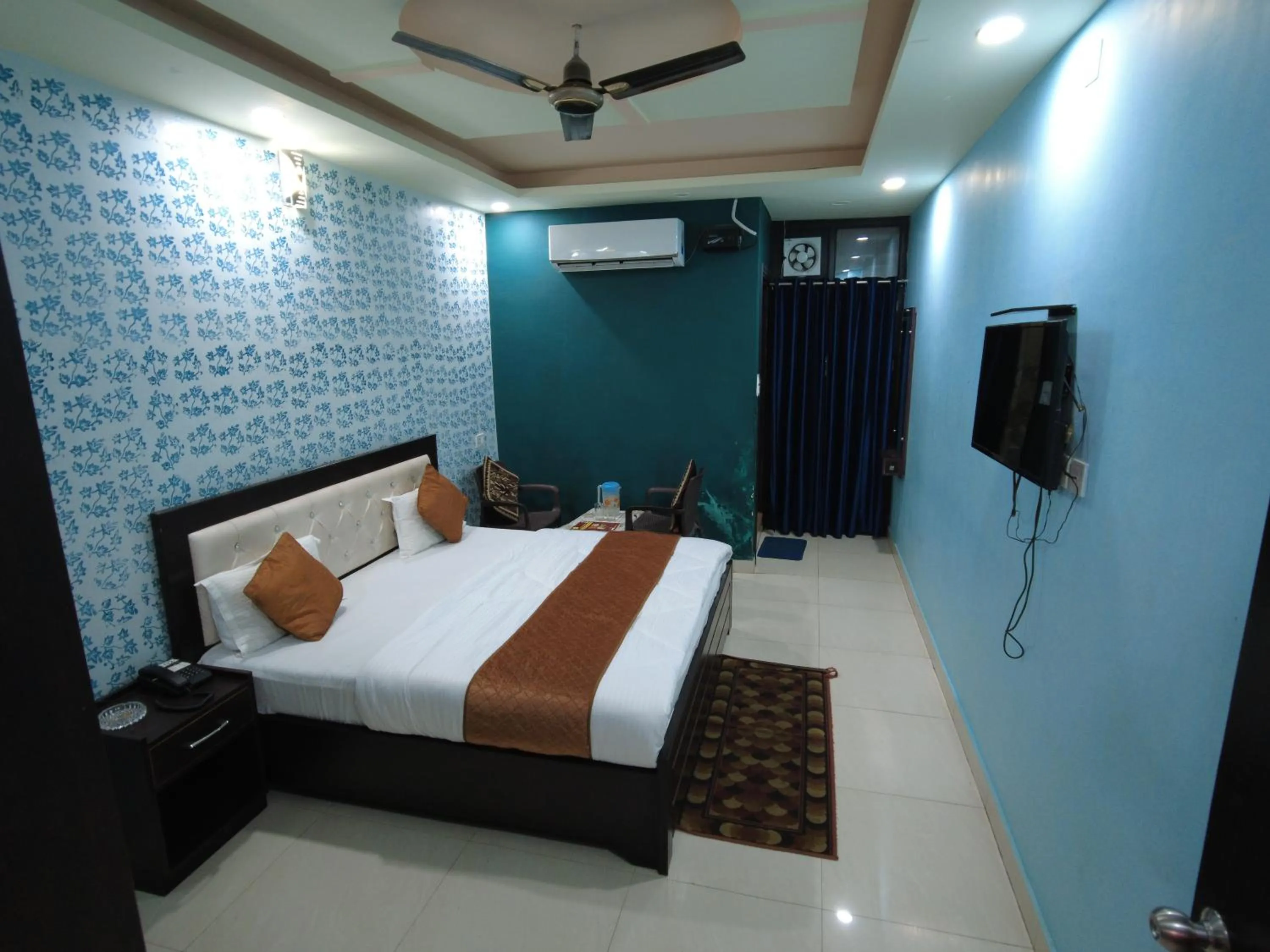 Bedroom, Bed in Hotel Dev Bhoomi Inn