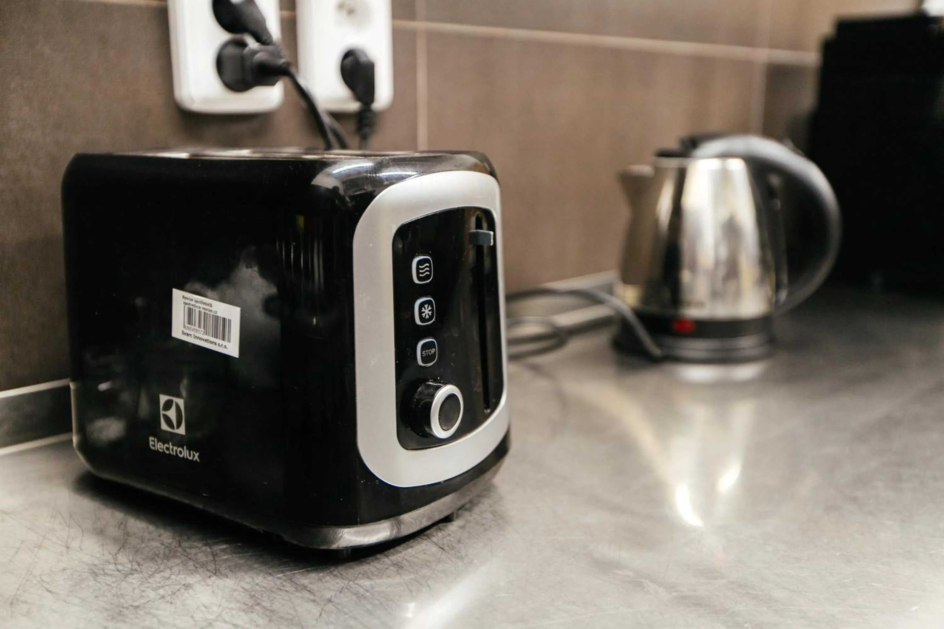 Communal kitchen in Hostel Mandarinka