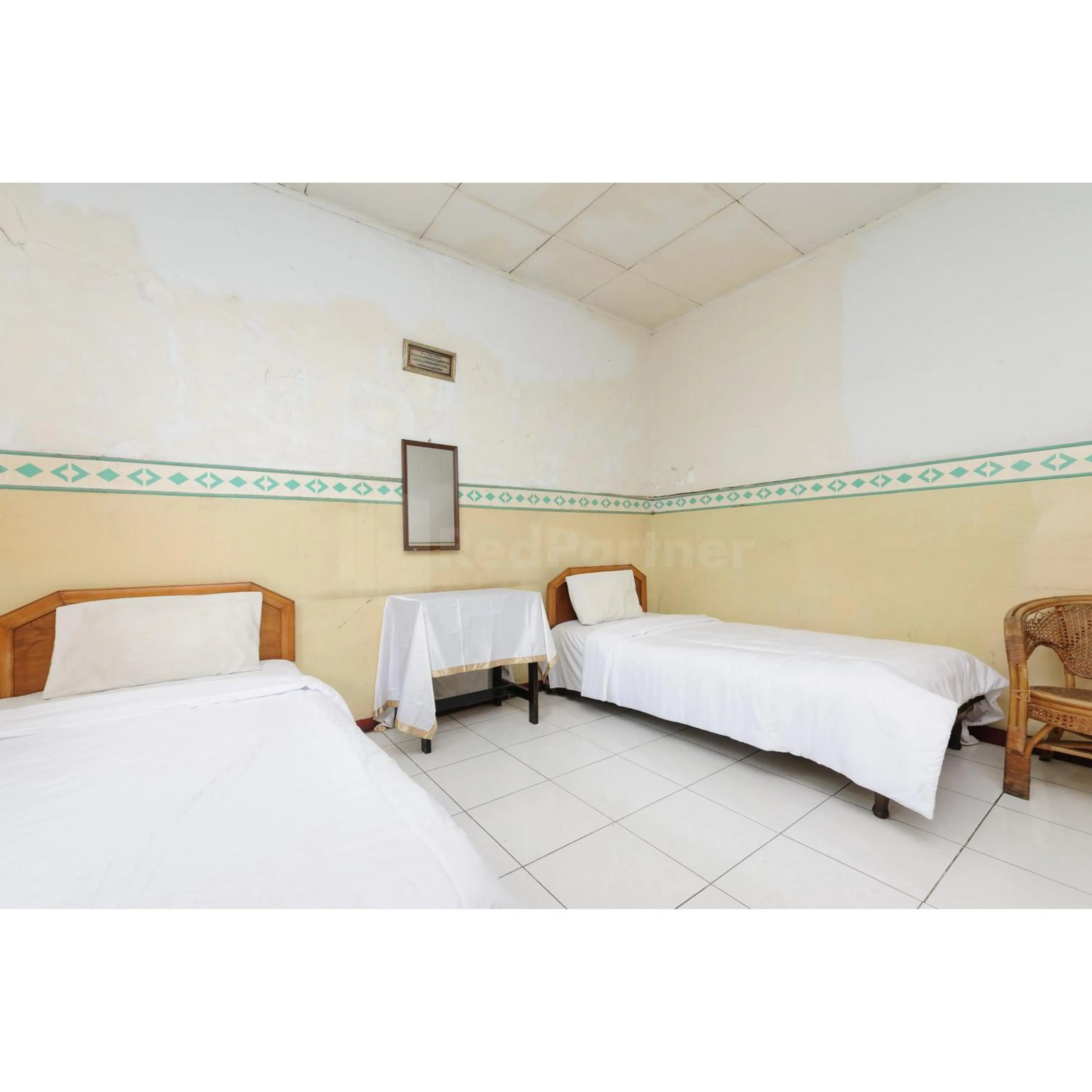 Bedroom, Bed in Hotel Al Hakim Syariah Redpartner