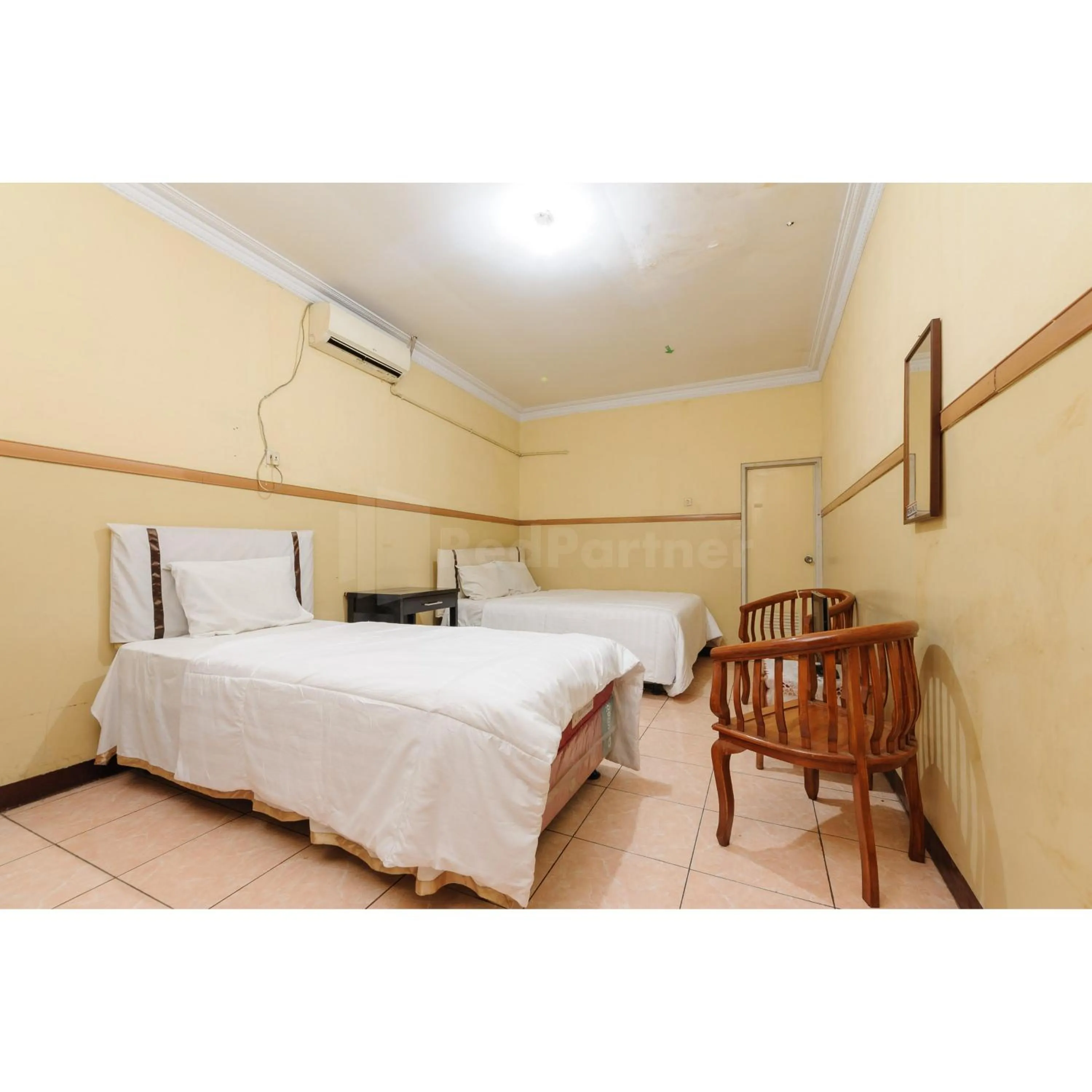 Bedroom, Bed in Hotel Al Hakim Syariah Redpartner