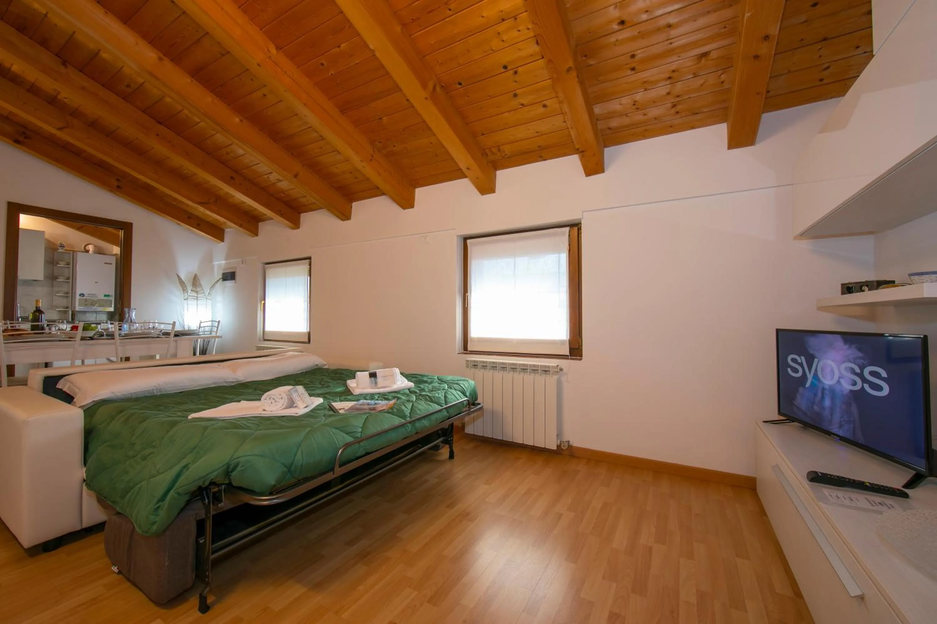 Living room, Bed in Residenza al Ponte