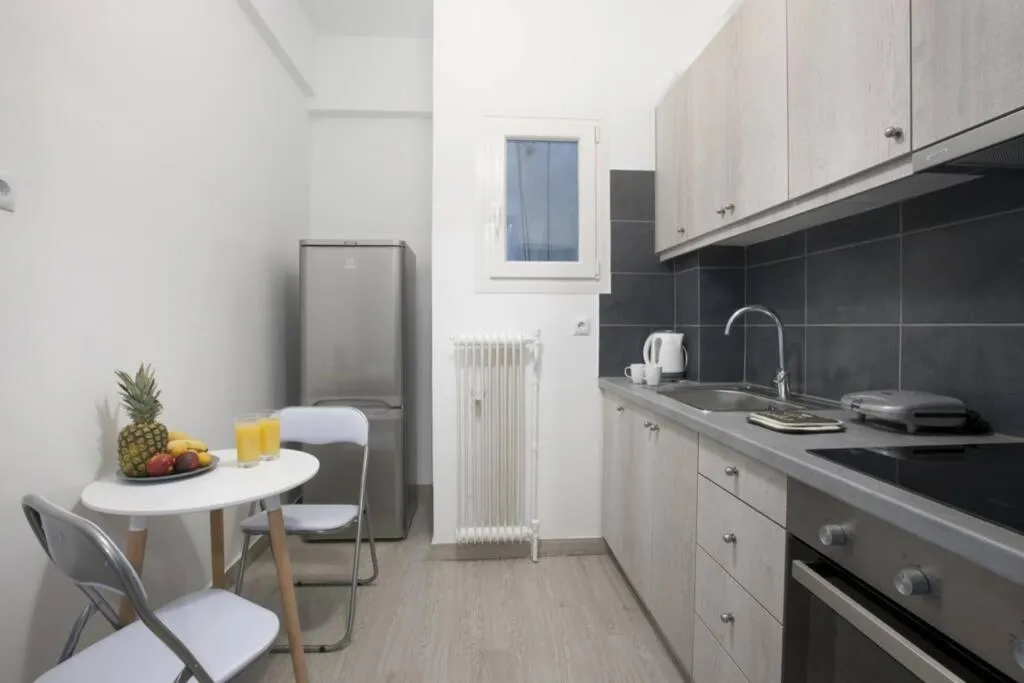 Kitchen or kitchenette in Kolonos, a renovated apartment