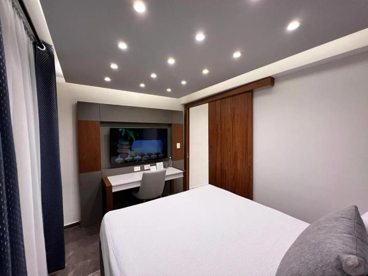 Bed in Seven Boutique Apartments Cancún